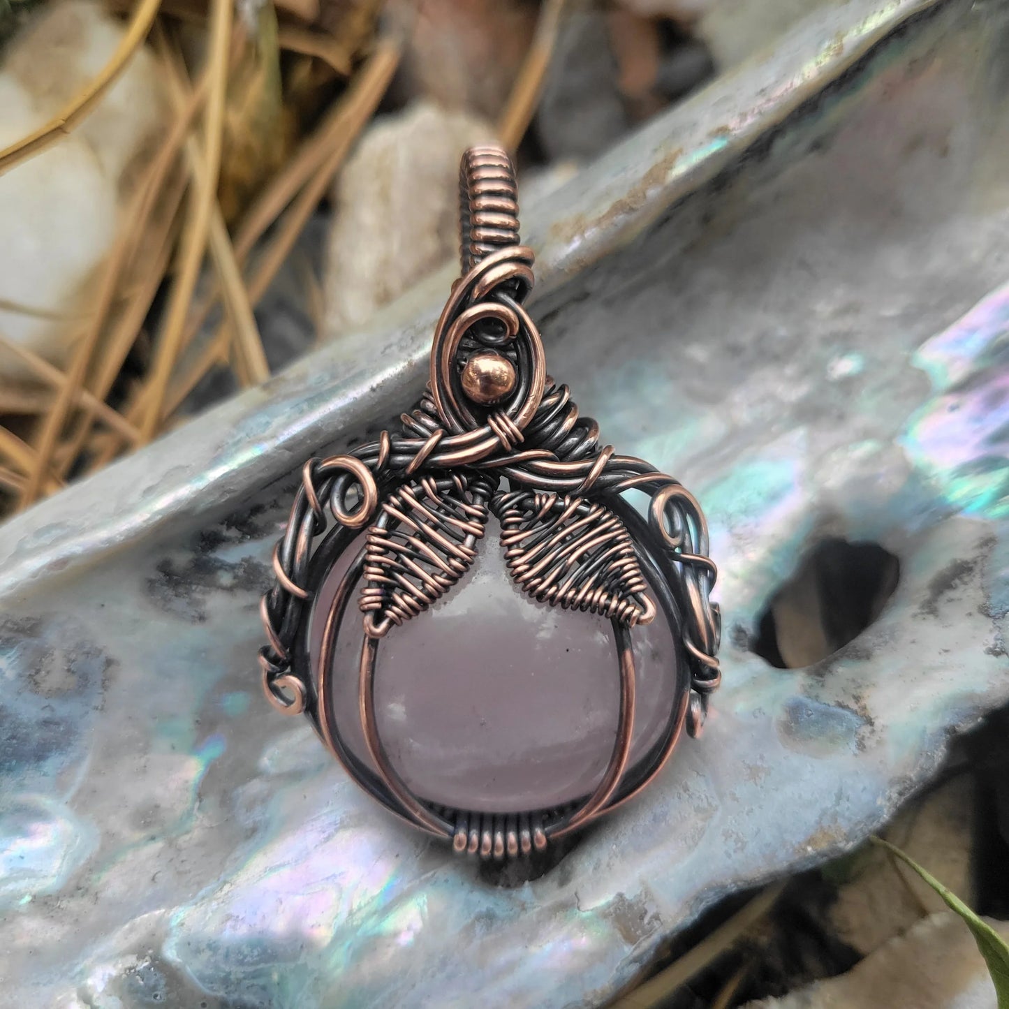 Handcrafted Rose Quartz Oxidized Copper Pumpkin Pendant Necklace — side view