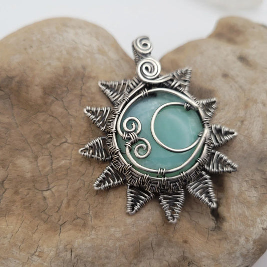 Handcrafted Blue Peruvian Opal Sterling Silver Sun and Moon Pendant Necklace — front view