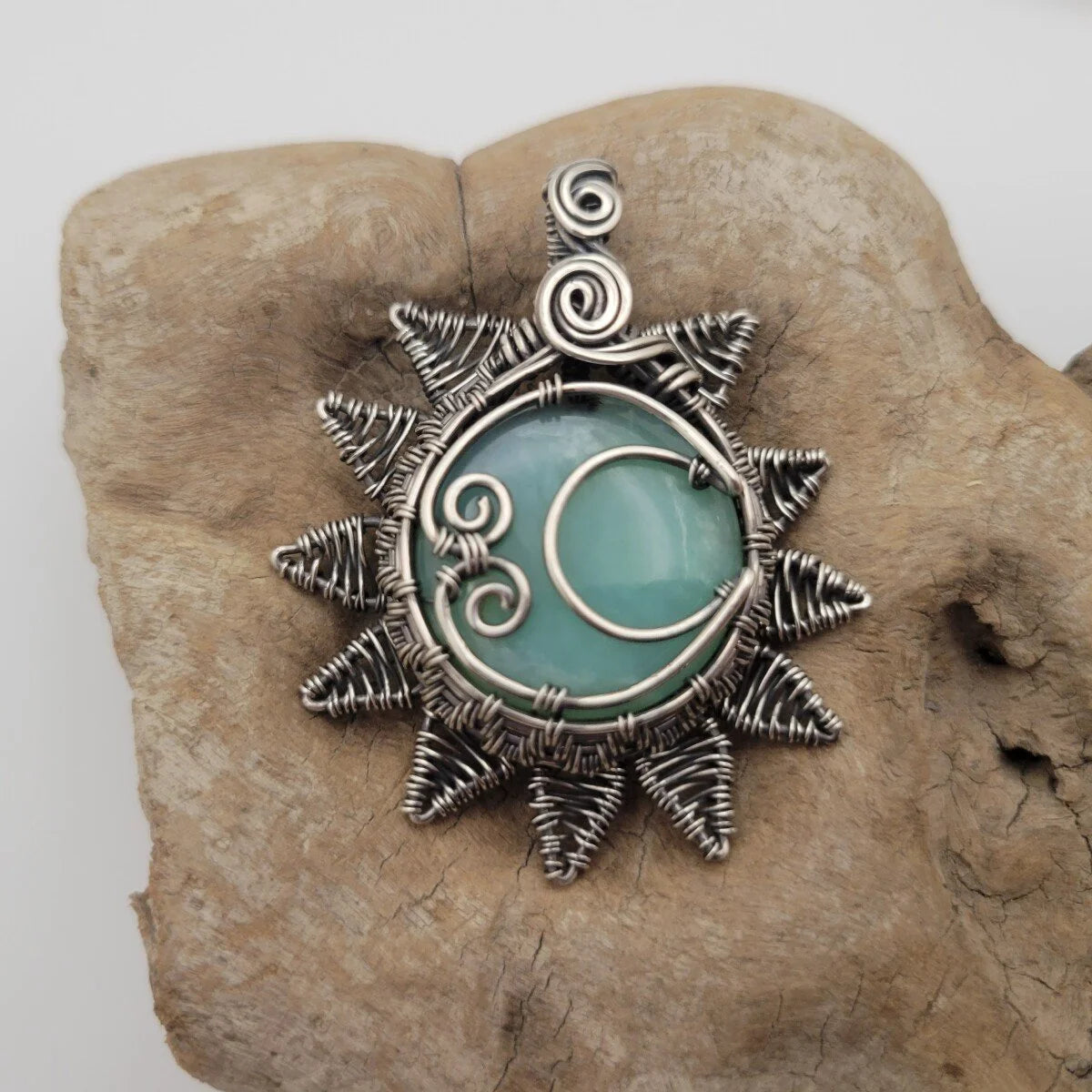 Handcrafted Blue Peruvian Opal Sterling Silver Sun and Moon Pendant Necklace — reverse view