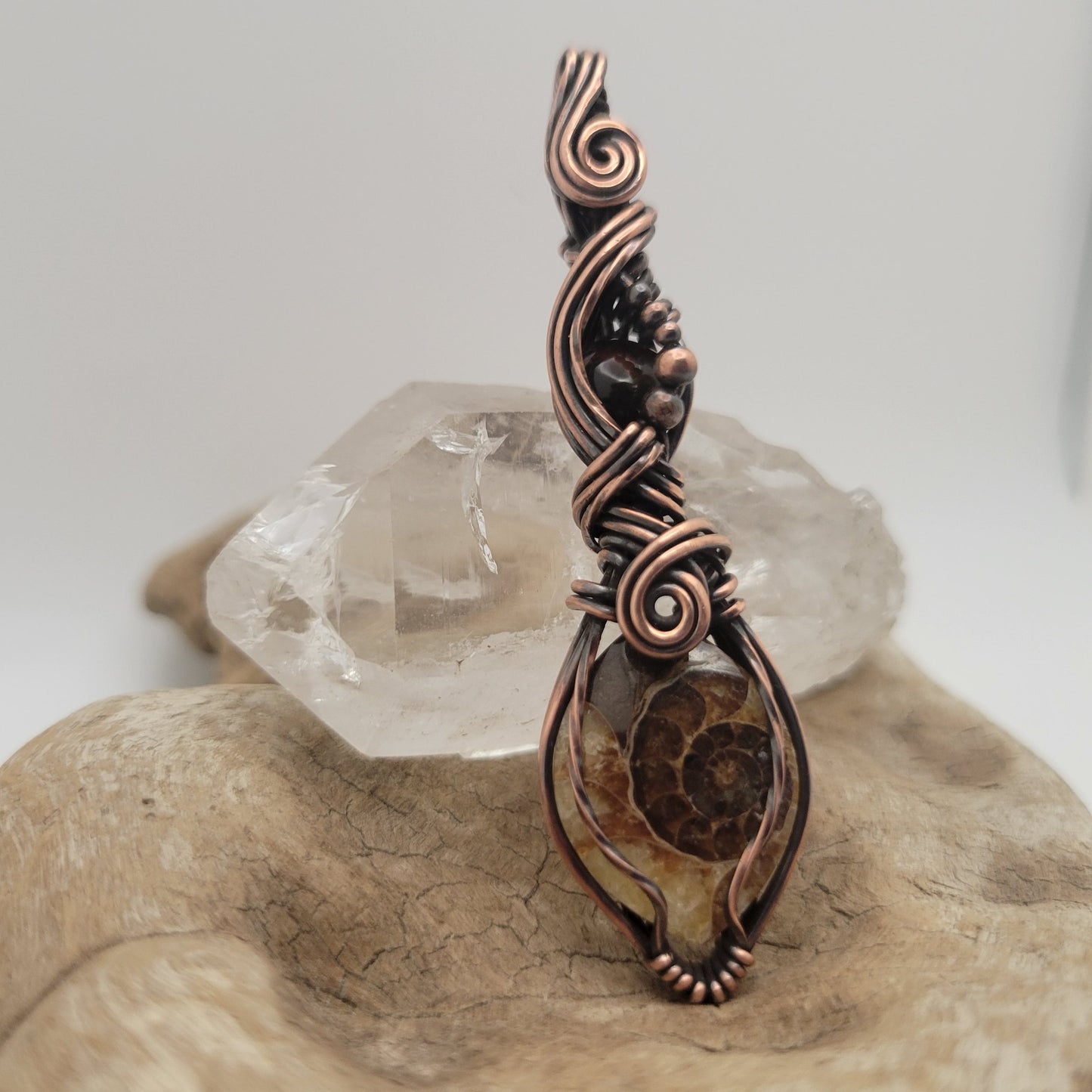 Handcrafted Ammonite and Black Opal Copper Pendant Necklace — close-up