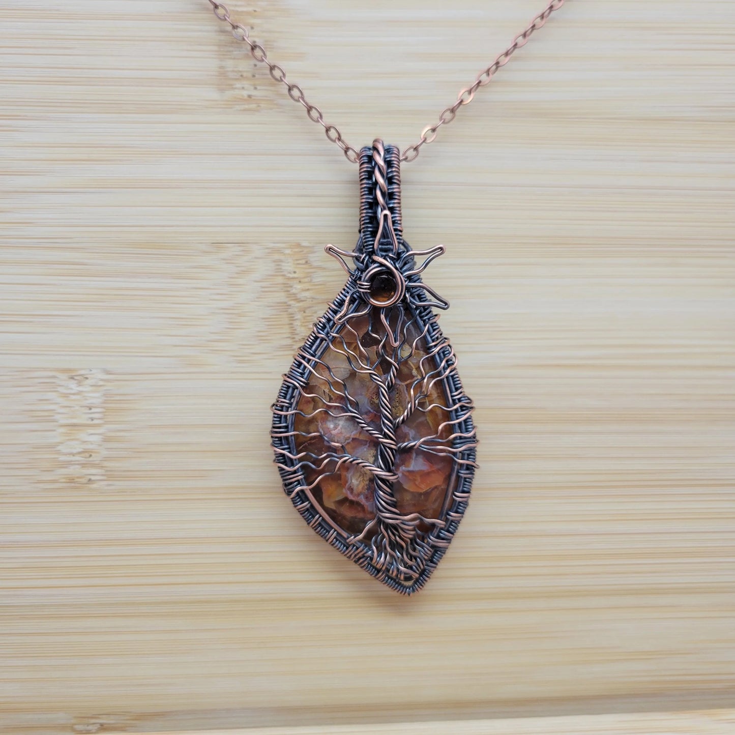 Handcrafted Desert Agate and Garnet Copper Tree of Life Pendant Necklace — side view