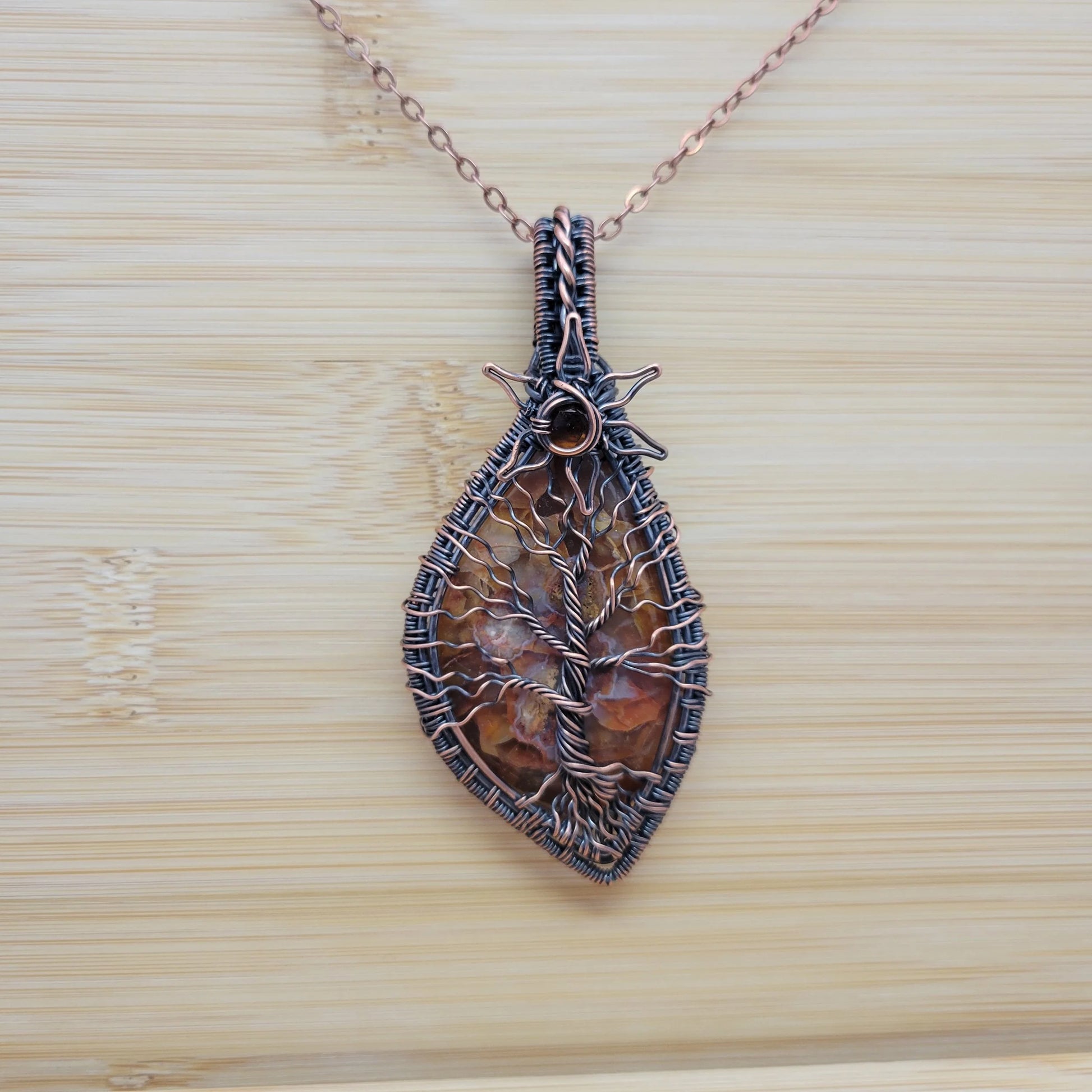 Handcrafted Desert Agate and Garnet Copper Tree of Life Pendant Necklace — side view
