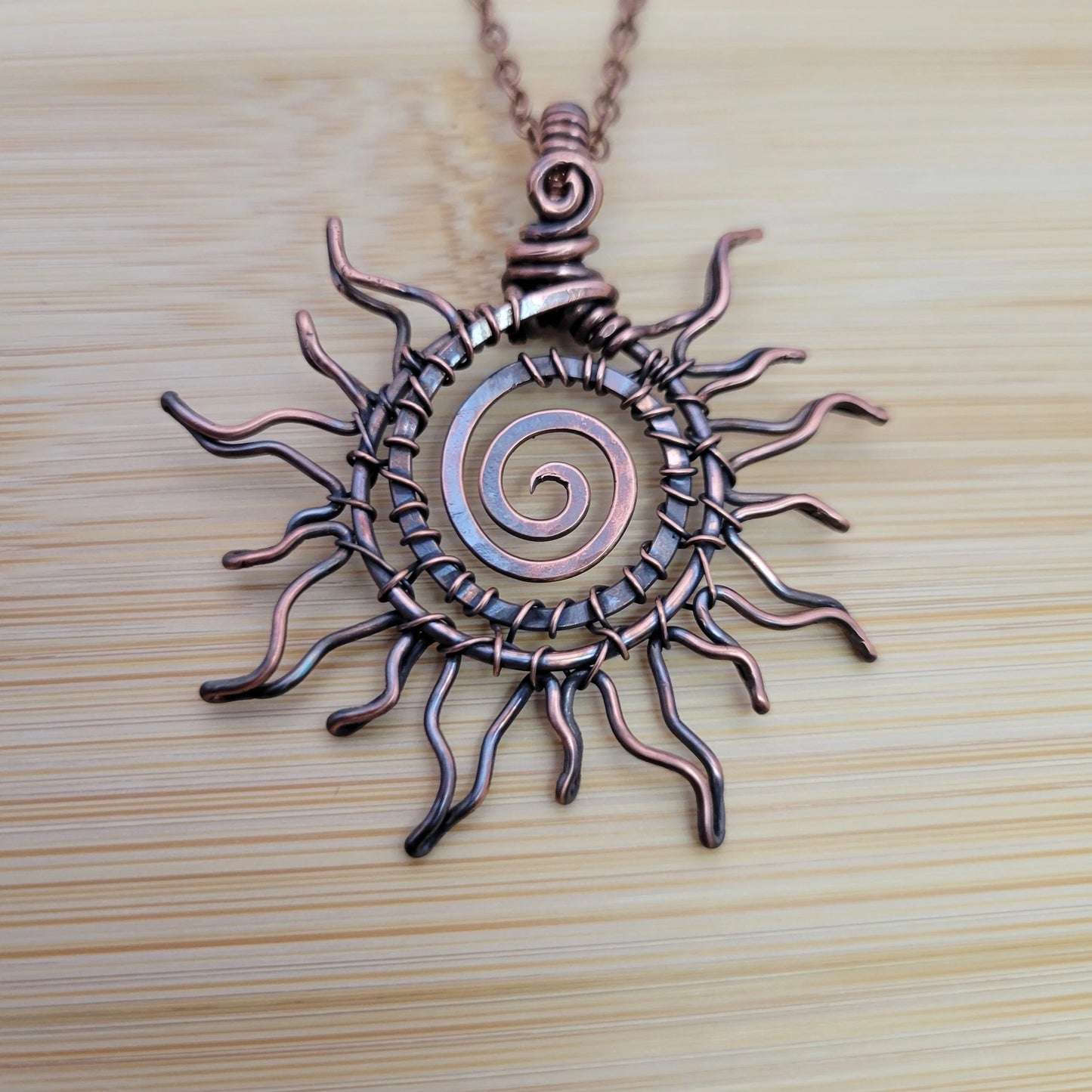 Handcrafted Copper Sun Pendant Necklace — front view
