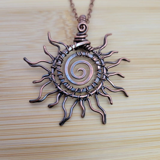 Handcrafted Copper Sun Pendant Necklace — front view