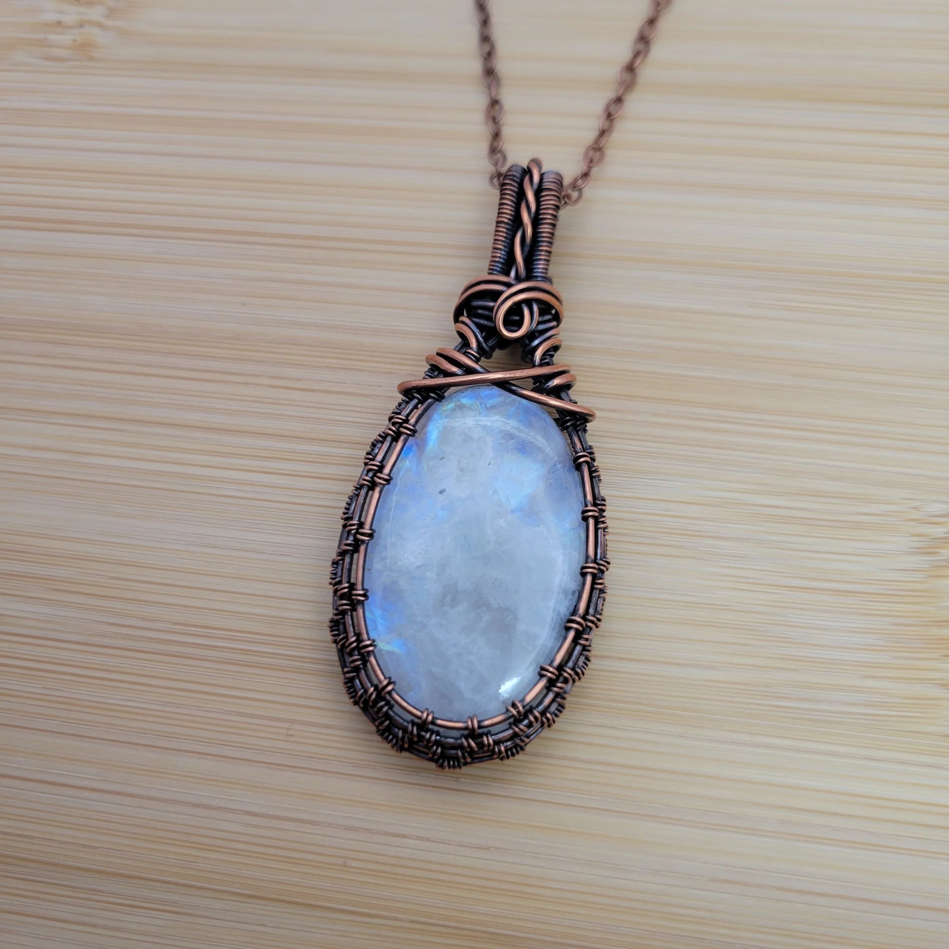 Handcrafted Rainbow Moonstone and Moonstone Copper Pendant Necklace — side view