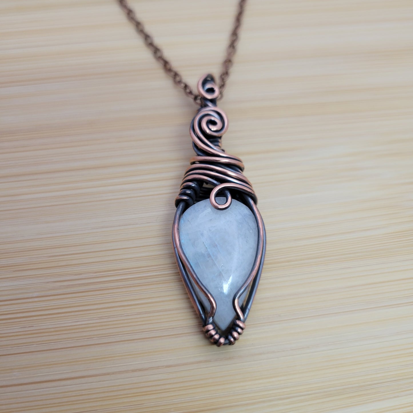 Handcrafted Rainbow Moonstone and Moonstone Copper Pendant Necklace — side view
