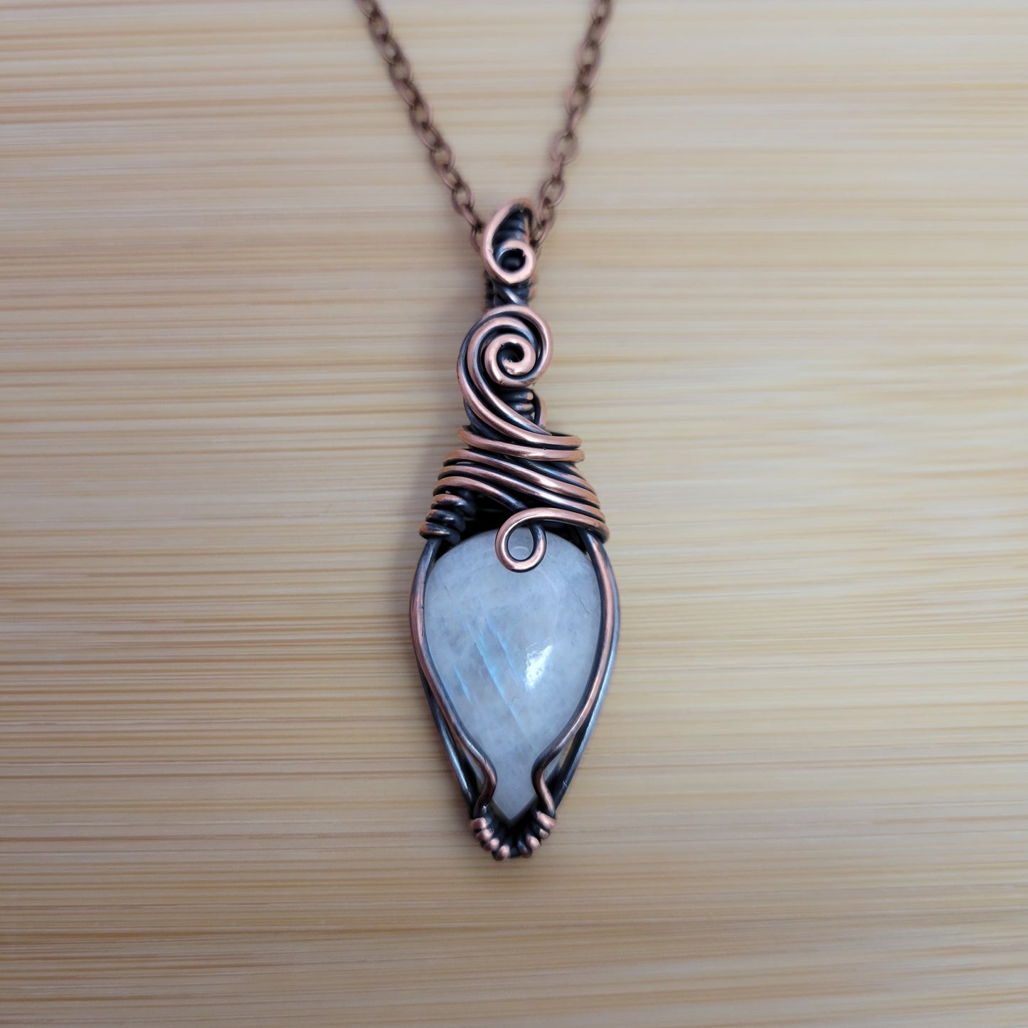 Handcrafted Rainbow Moonstone and Moonstone Copper Pendant Necklace — front view