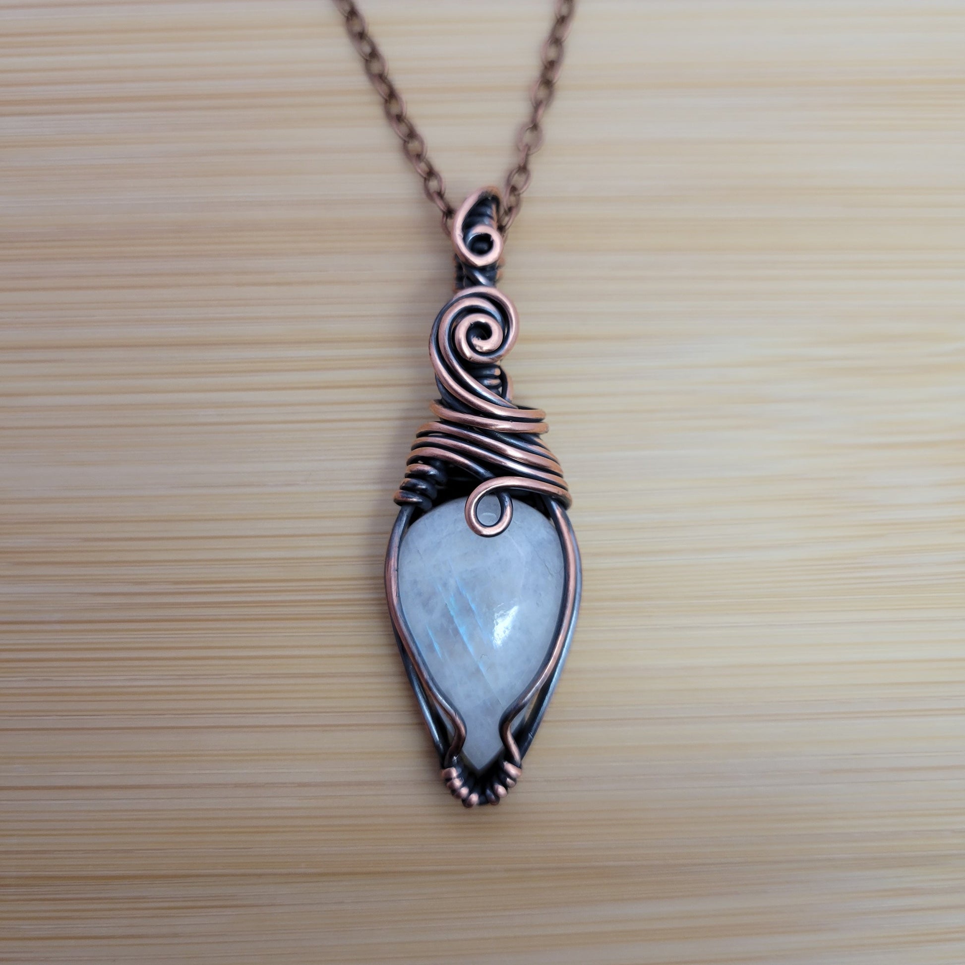 Handcrafted Rainbow Moonstone and Moonstone Copper Pendant Necklace — front view