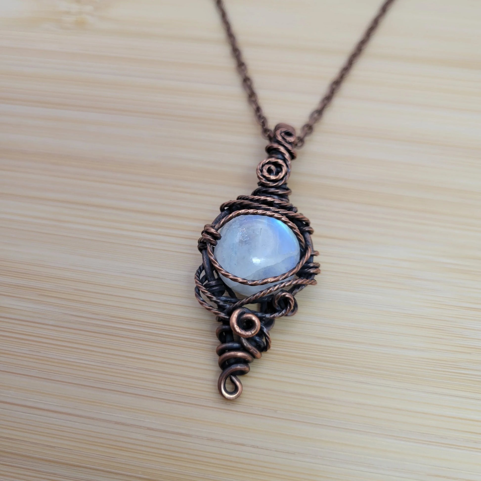 Handcrafted Rainbow Moonstone and Moonstone Copper Pendant Necklace — side view