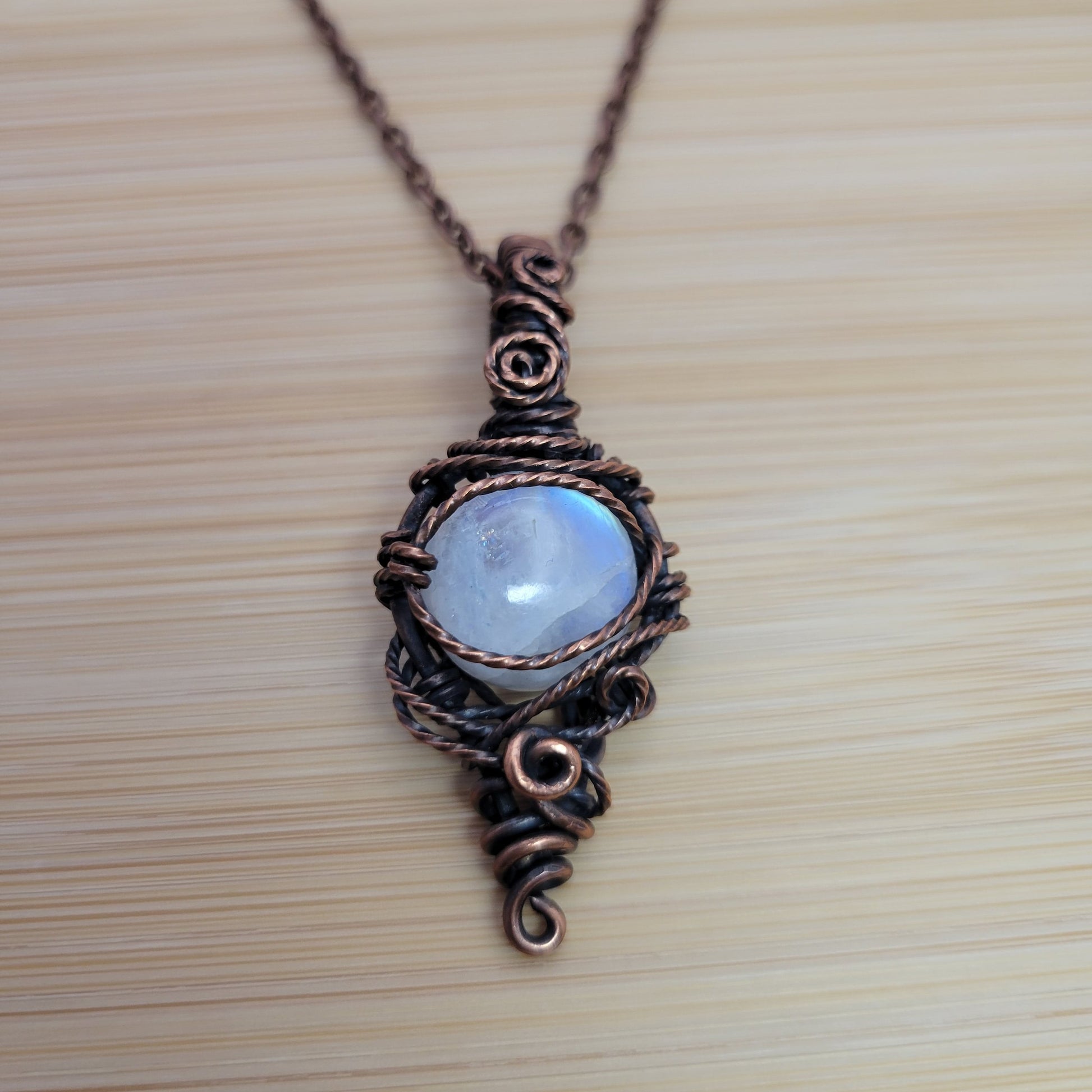 Handcrafted Rainbow Moonstone and Moonstone Copper Pendant Necklace — front view