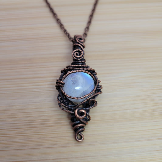 Handcrafted Rainbow Moonstone and Moonstone Copper Pendant Necklace — front view