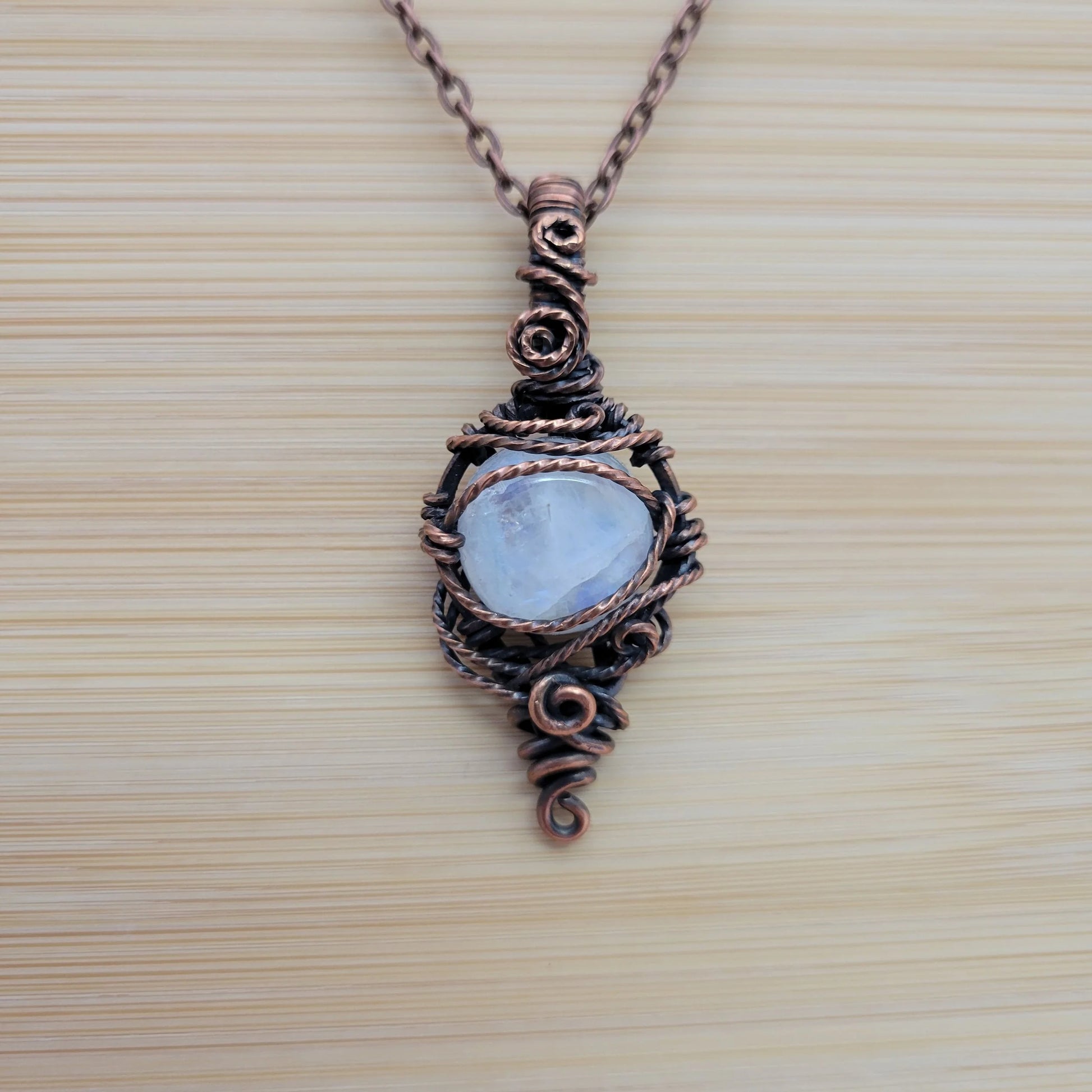Handcrafted Rainbow Moonstone and Moonstone Copper Pendant Necklace — reverse view