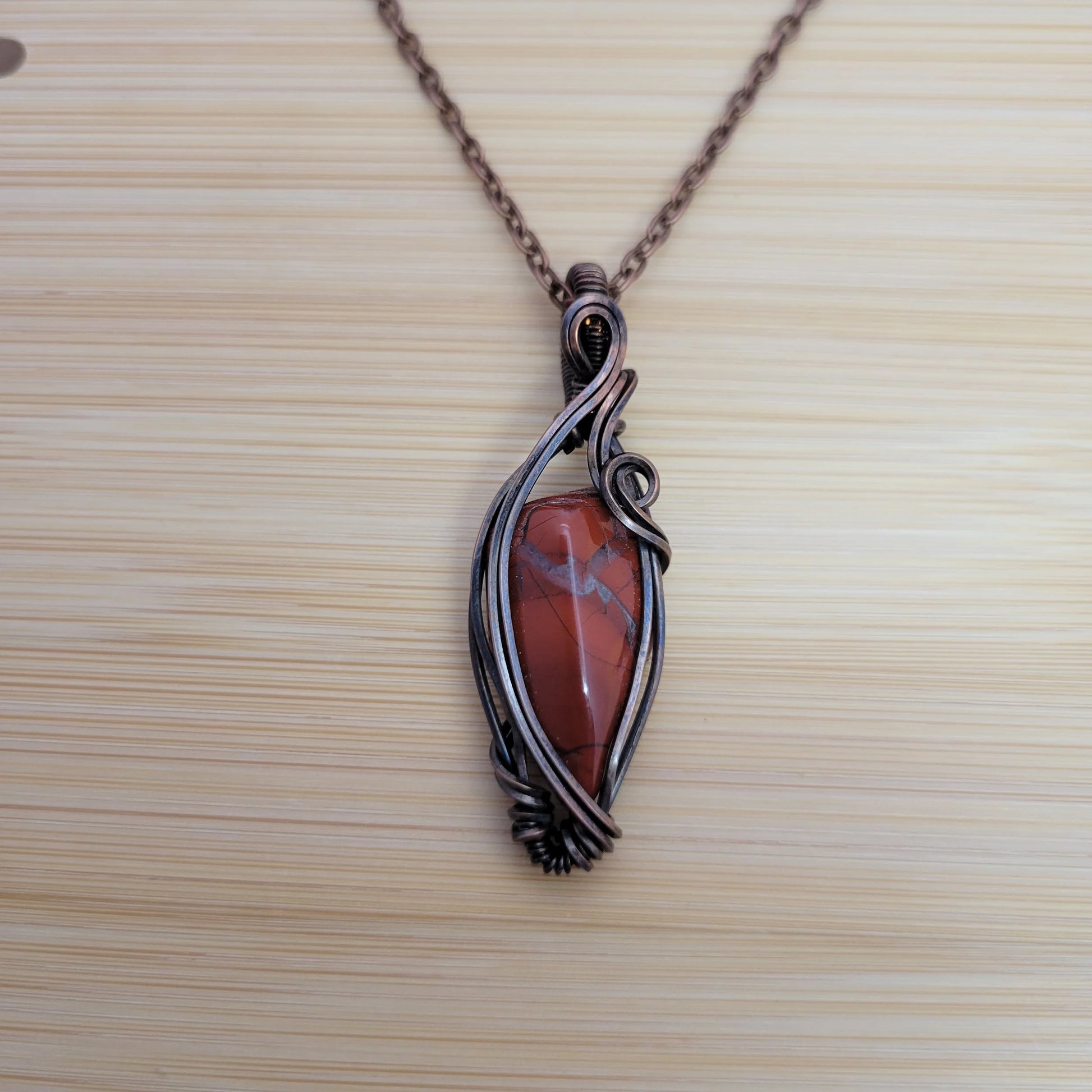Handcrafted Red Jasper Copper Pendant Necklace — close-up