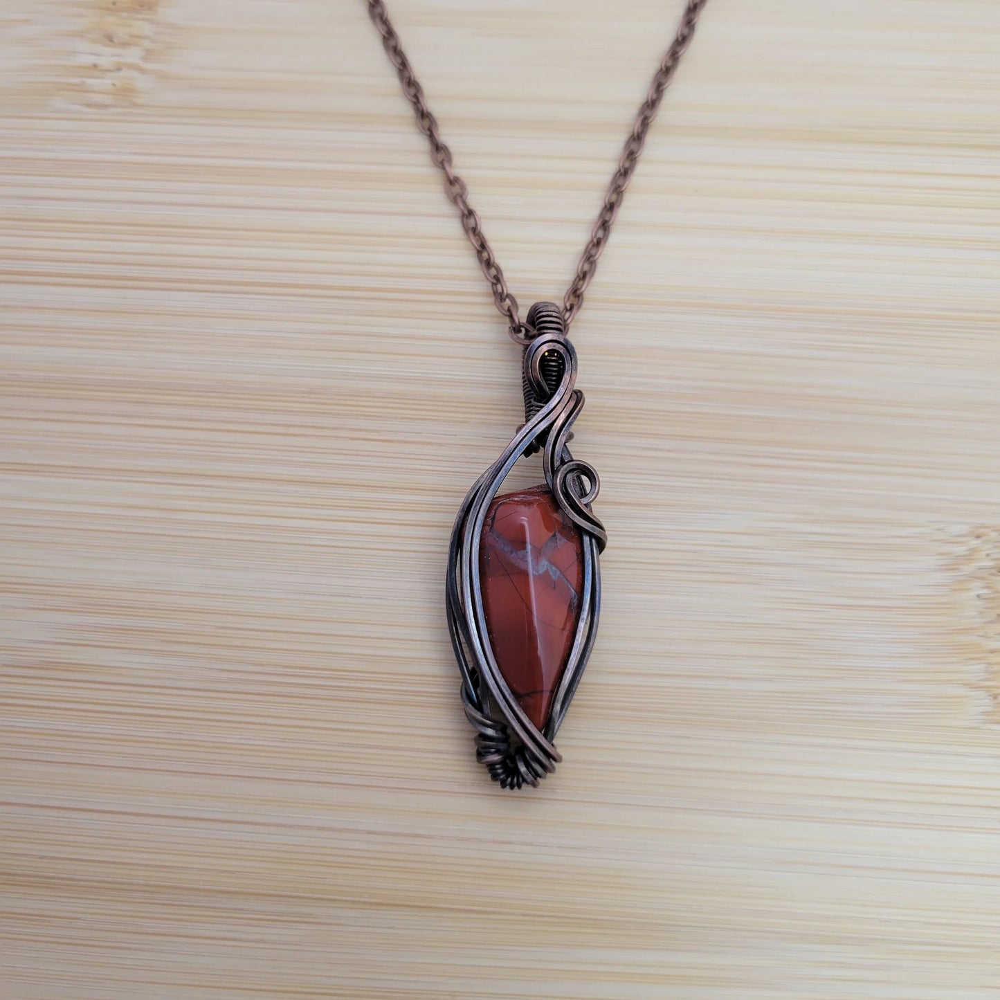 Handcrafted Red Jasper Copper Pendant Necklace — side view