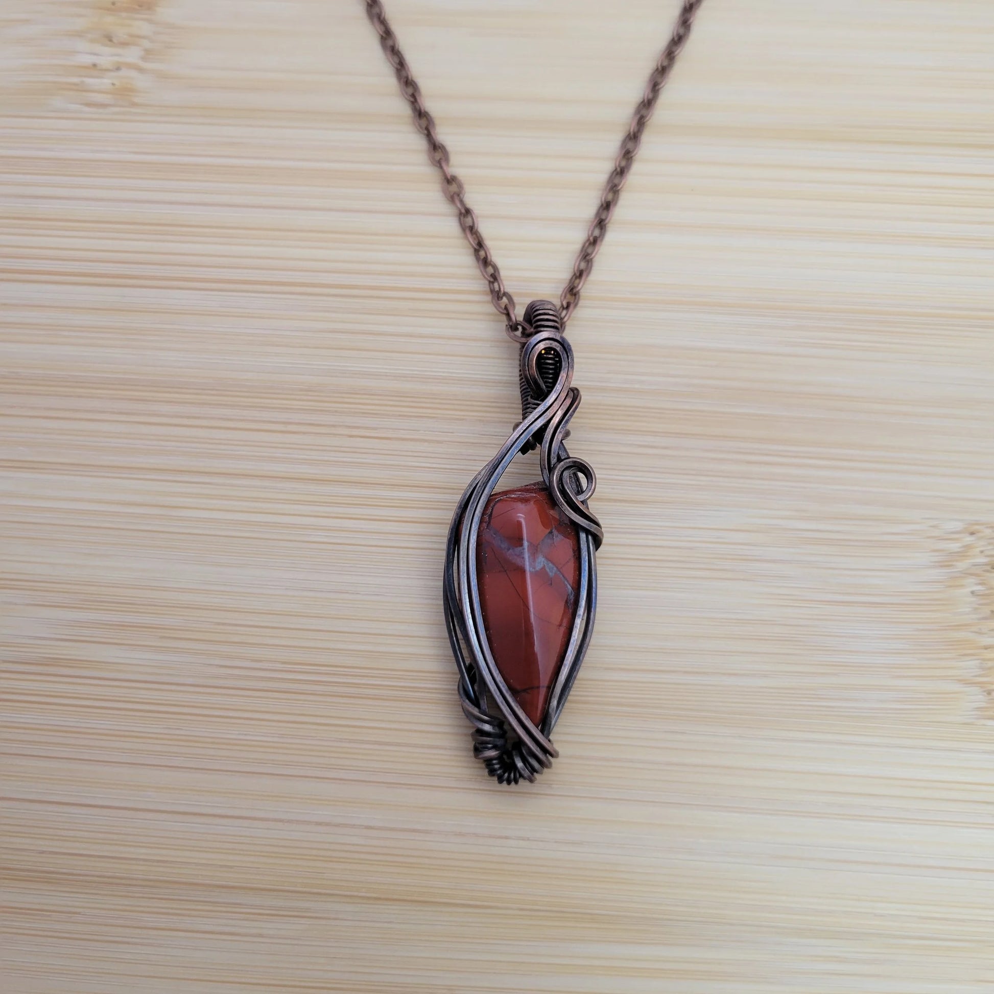 Handcrafted Red Jasper Copper Pendant Necklace — side view