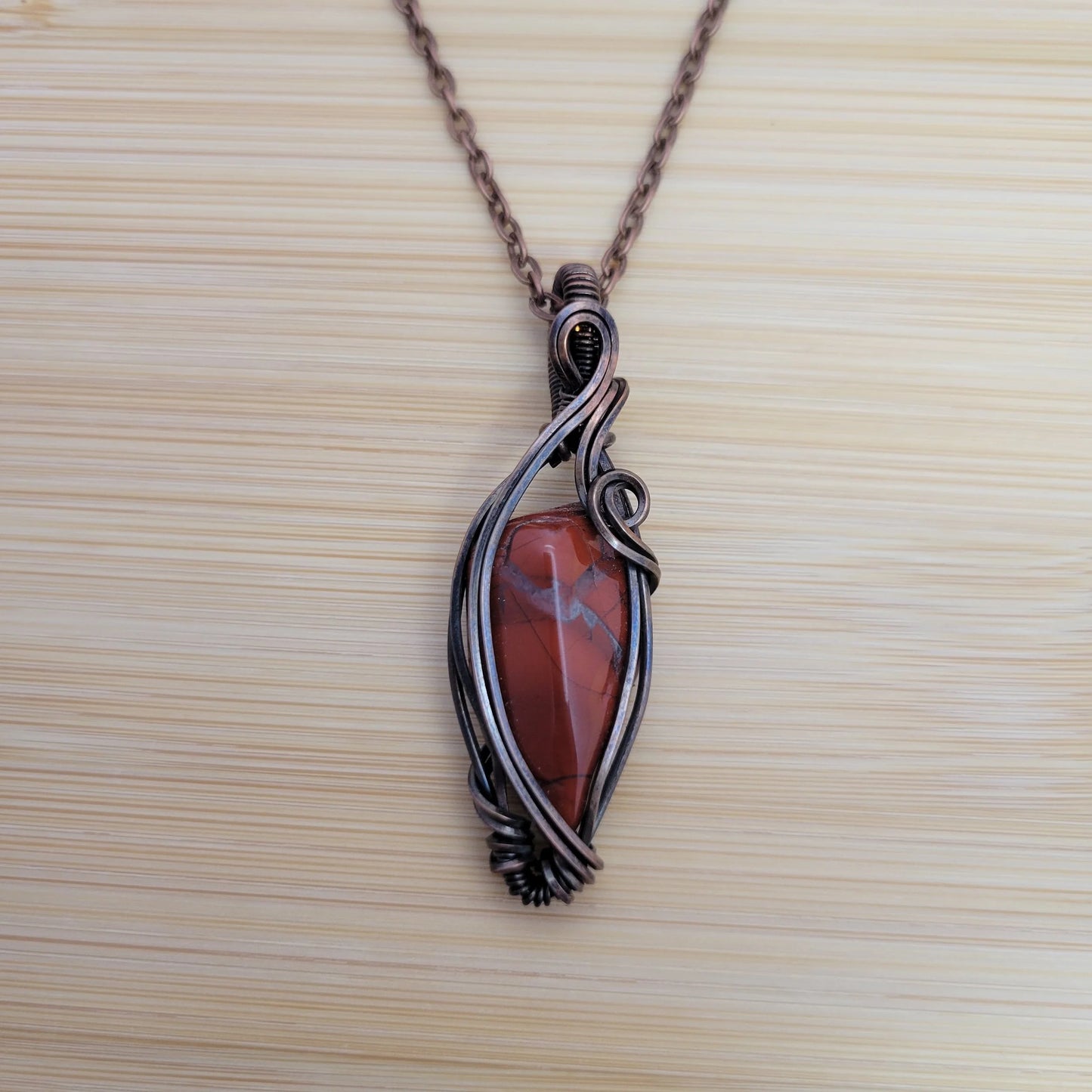 Handcrafted Red Jasper Copper Pendant Necklace — reverse view