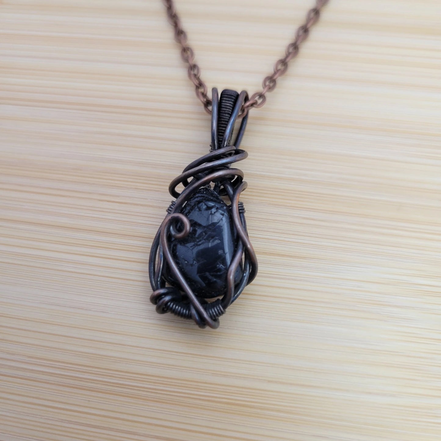 Handcrafted Tourmaline and Black Tourmaline Copper Pendant Necklace — close-up