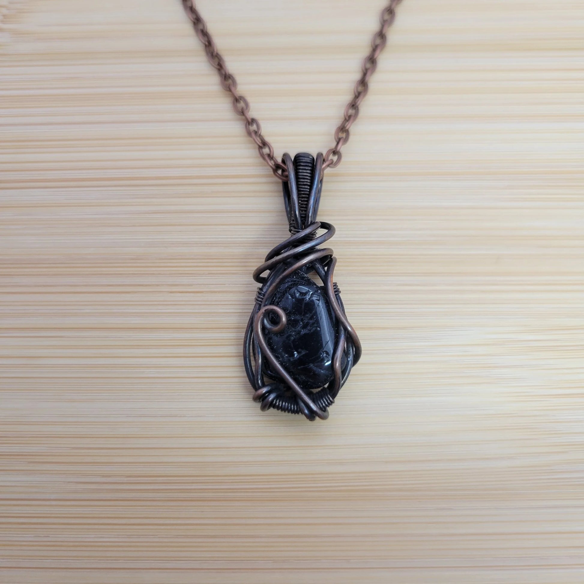 Handcrafted Tourmaline and Black Tourmaline Copper Pendant Necklace — front view