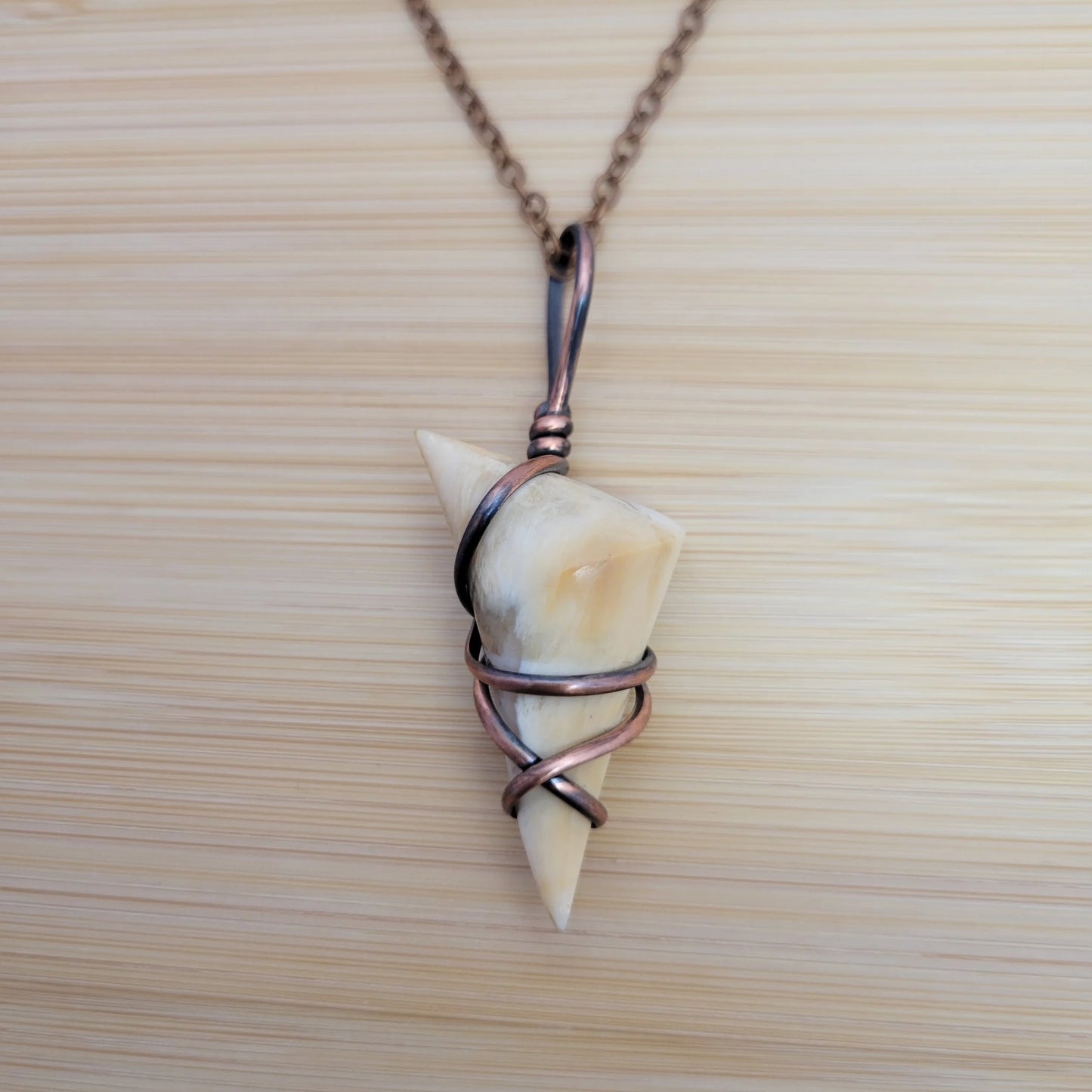 Handcrafted Petrified Wood Copper Pendant Necklace — front view