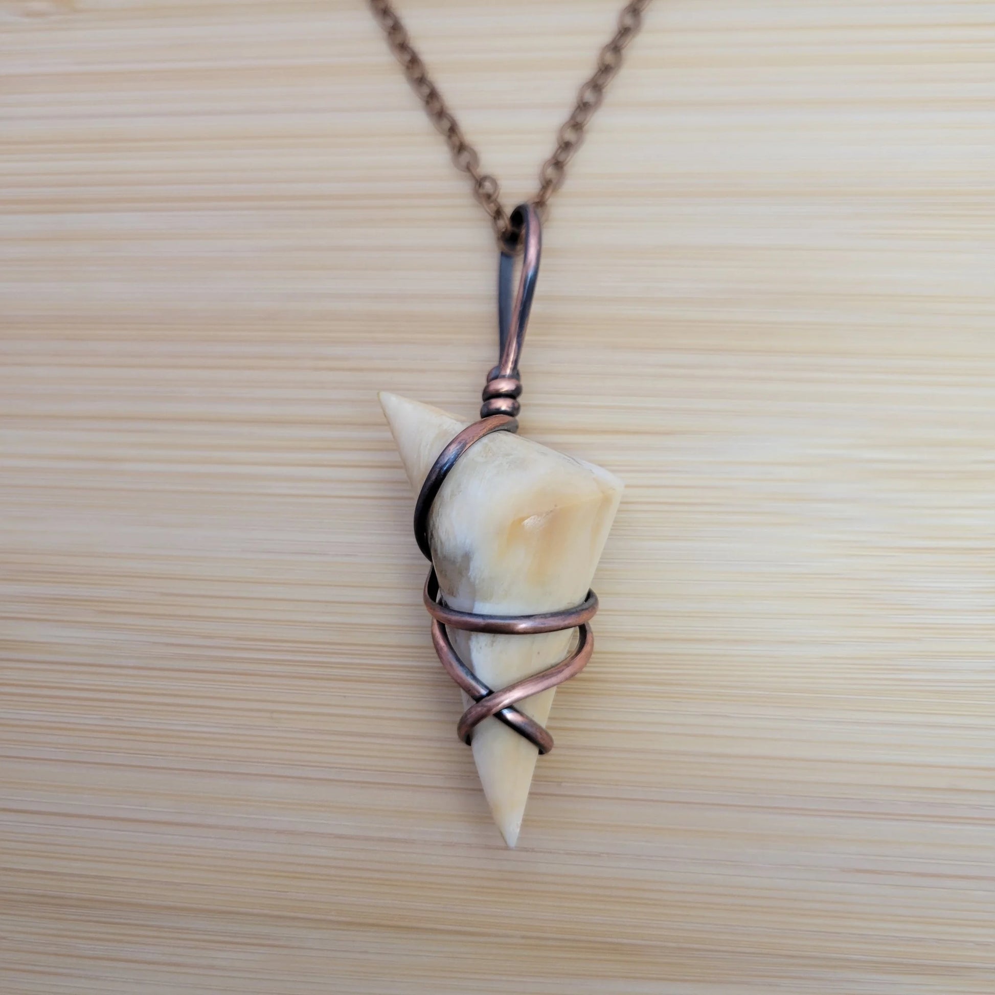 Handcrafted Petrified Wood Copper Pendant Necklace — front view