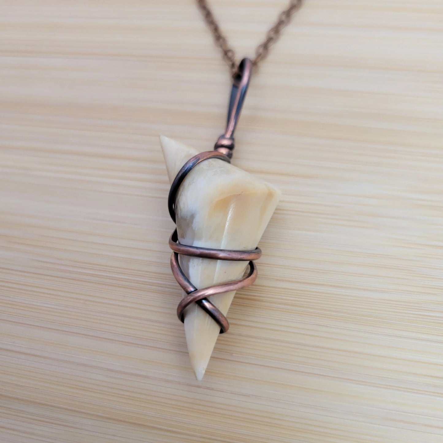 Handcrafted Petrified Wood Copper Pendant Necklace — side view