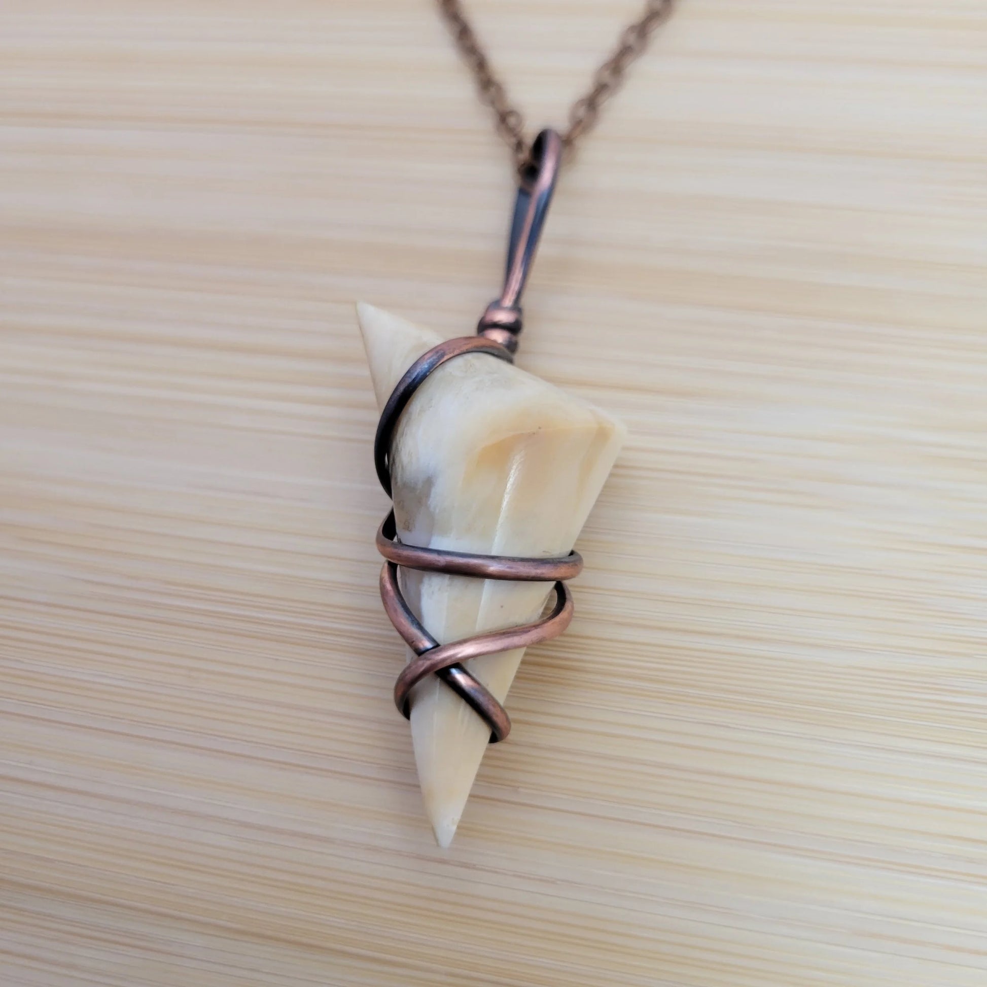 Handcrafted Petrified Wood Copper Pendant Necklace — side view