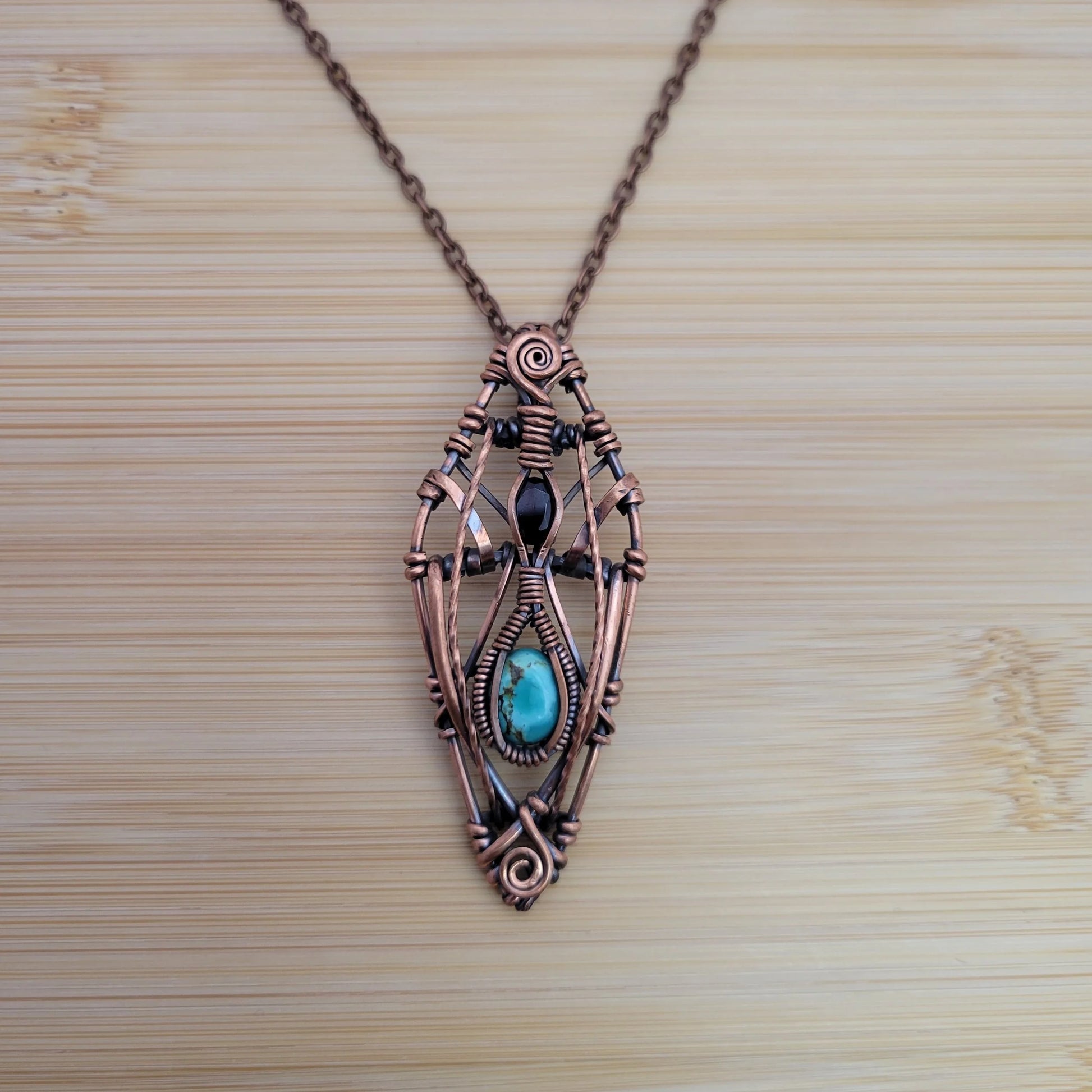 Handcrafted Garnet and Turquoise Copper Pendant Necklace — side view