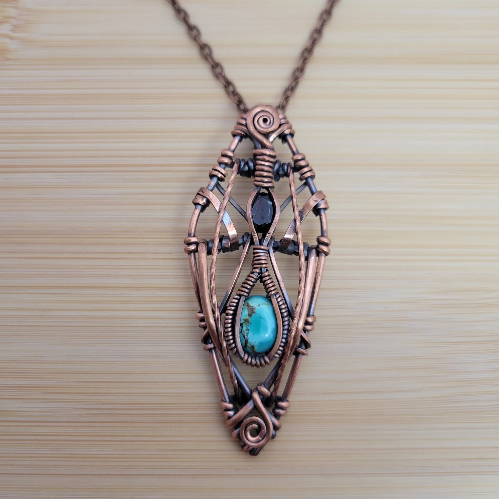Handcrafted Garnet and Turquoise Copper Pendant Necklace — detail view