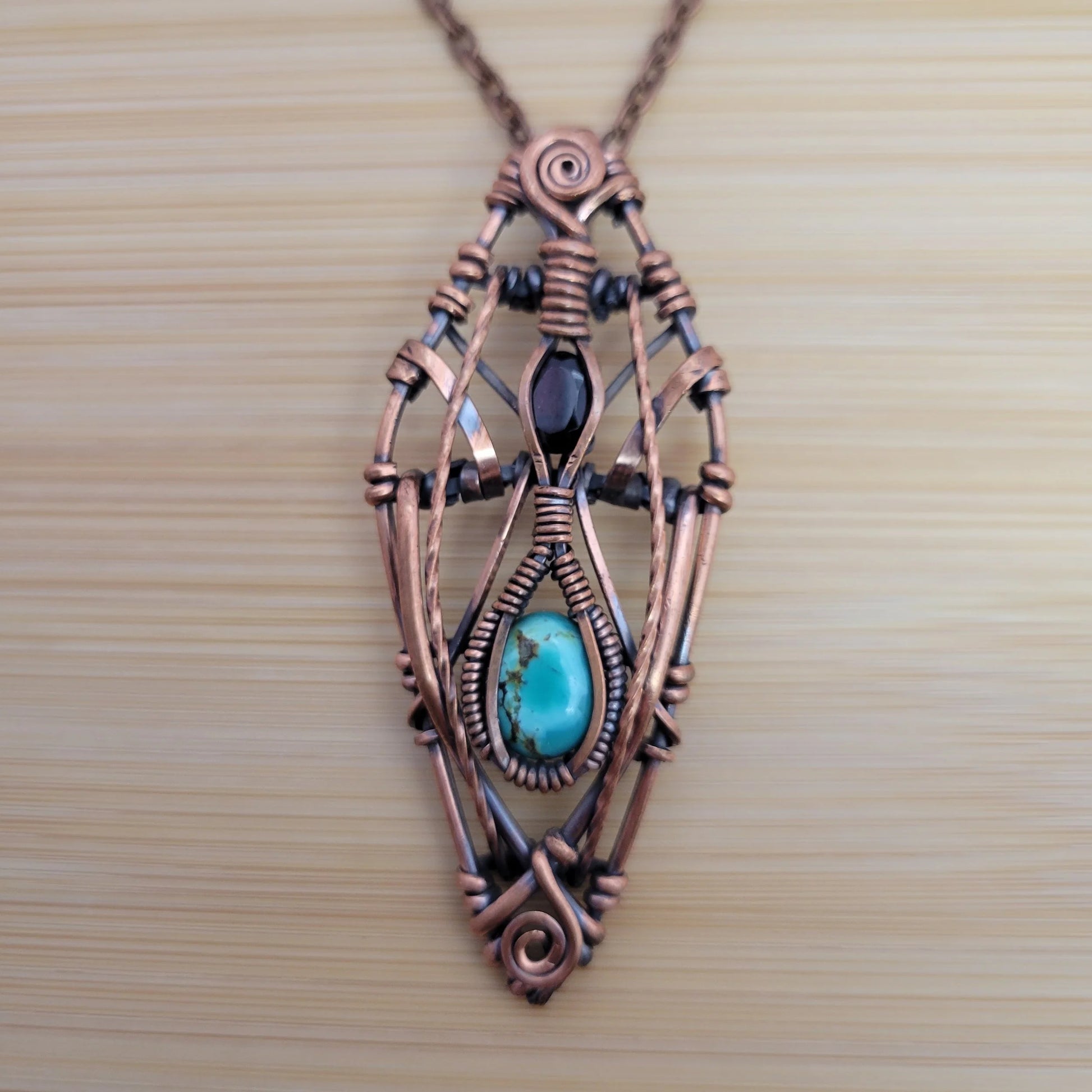 Handcrafted Garnet and Turquoise Copper Pendant Necklace — front view