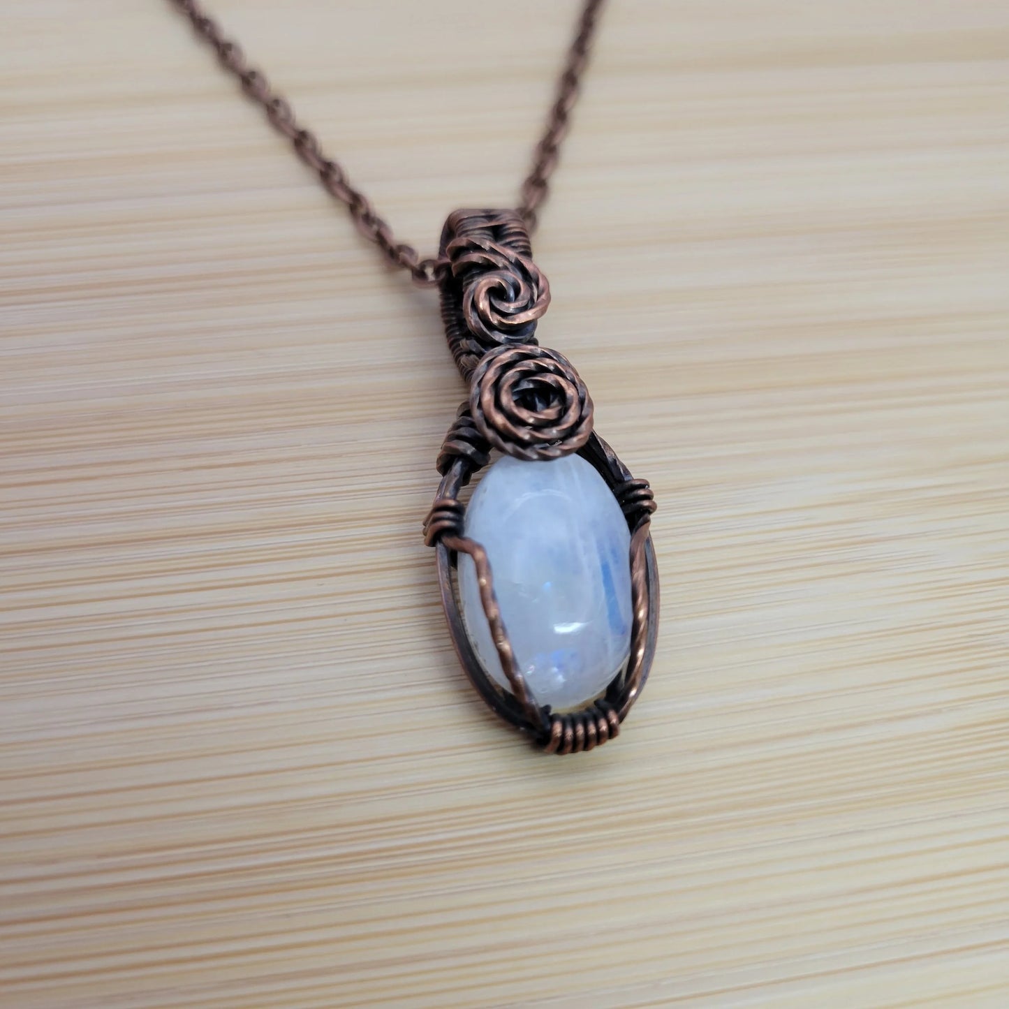 Handcrafted Rainbow Moonstone and Moonstone Copper Pendant Necklace — side view
