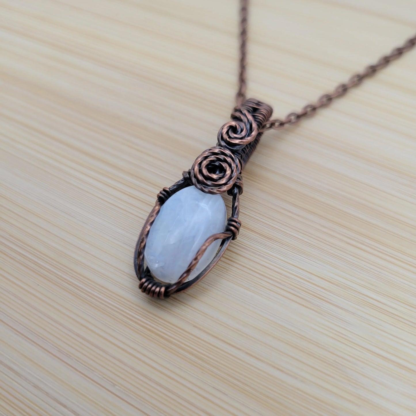 Handcrafted Rainbow Moonstone and Moonstone Copper Pendant Necklace — close-up