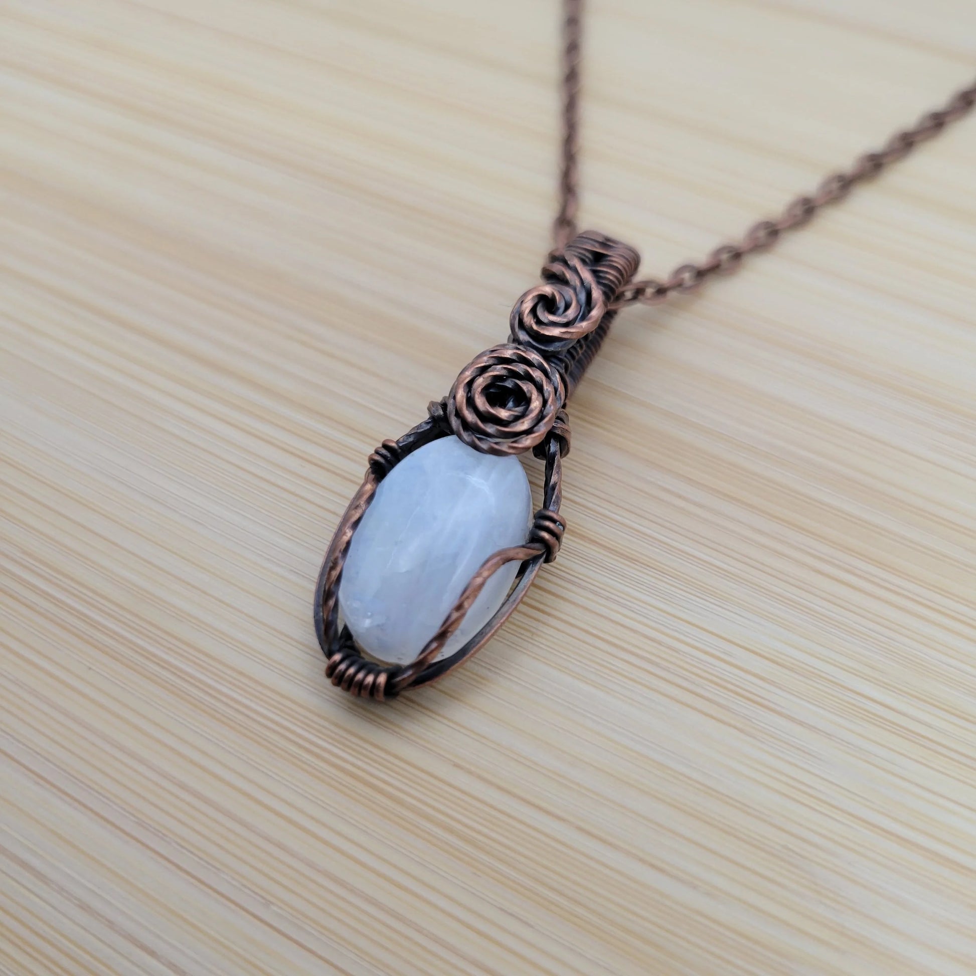 Handcrafted Rainbow Moonstone and Moonstone Copper Pendant Necklace — close-up
