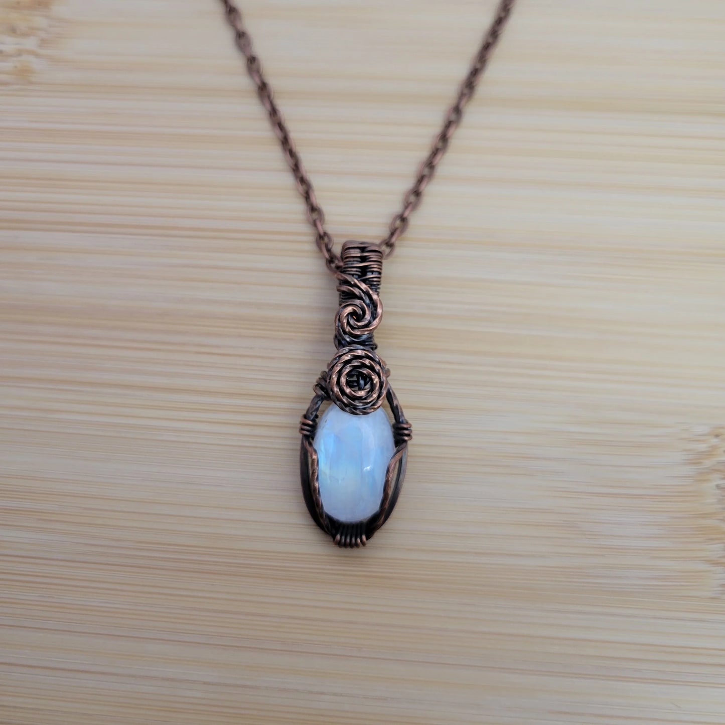 Handcrafted Rainbow Moonstone and Moonstone Copper Pendant Necklace — reverse view