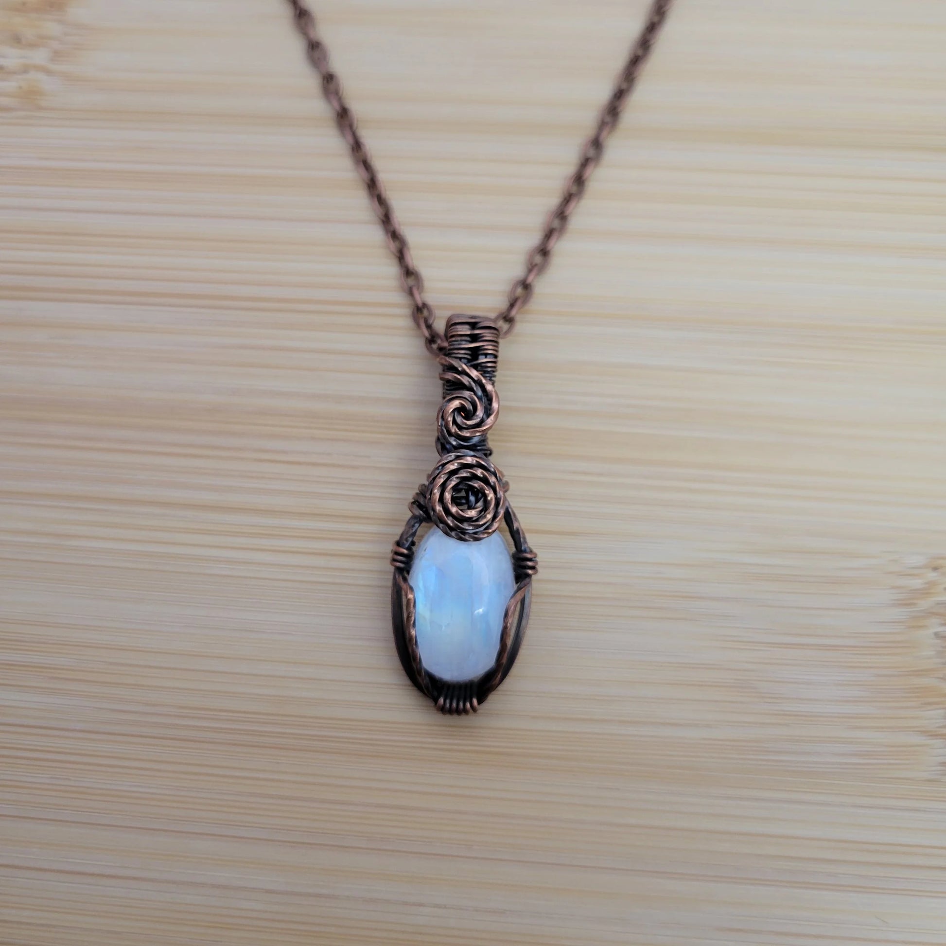 Handcrafted Rainbow Moonstone and Moonstone Copper Pendant Necklace — reverse view