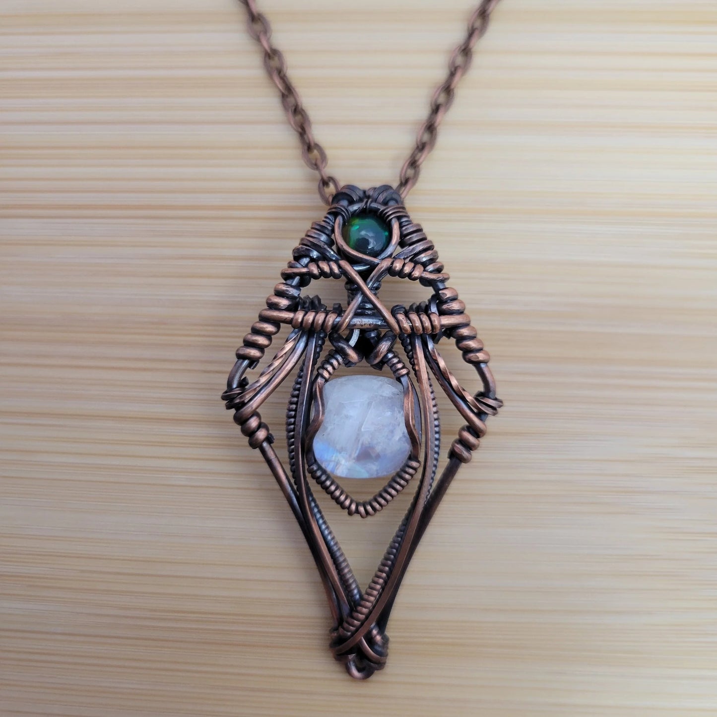 Handcrafted Black Opal and Rainbow Moonstone and Moonstone Copper Pendant Necklace — close-up