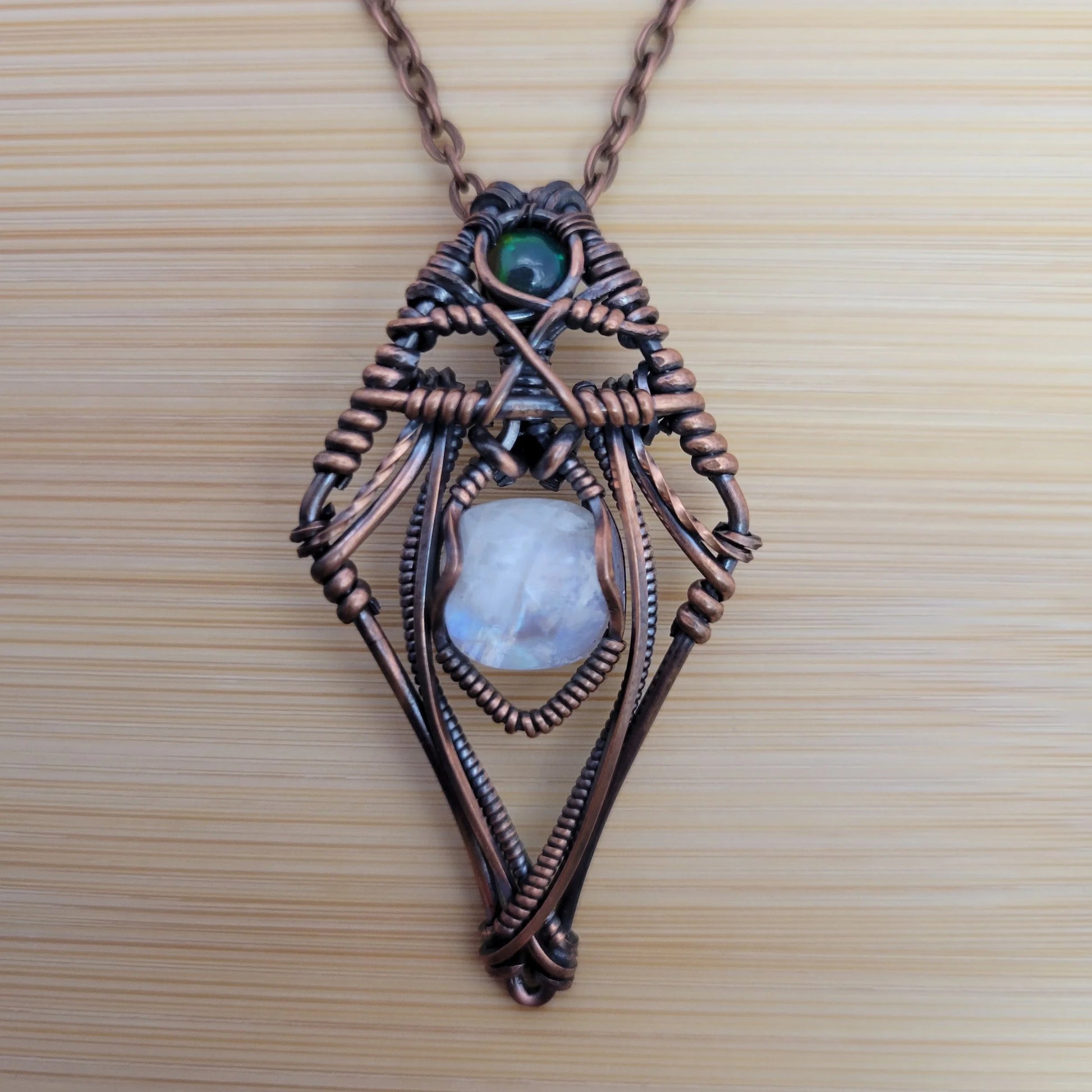 Handcrafted Black Opal and Rainbow Moonstone and Moonstone Copper Pendant Necklace — front view