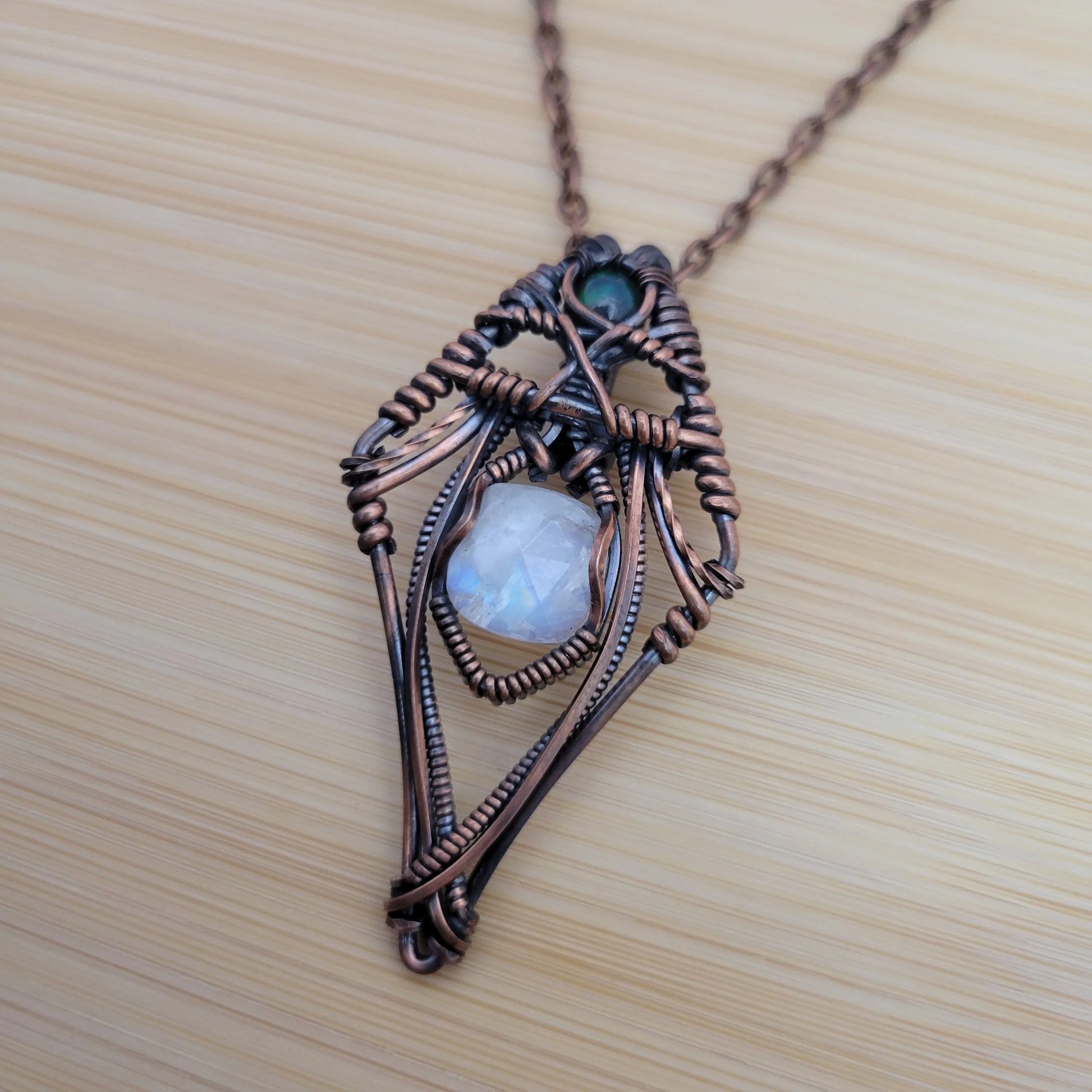 Handcrafted Black Opal and Rainbow Moonstone and Moonstone Copper Pendant Necklace — side view