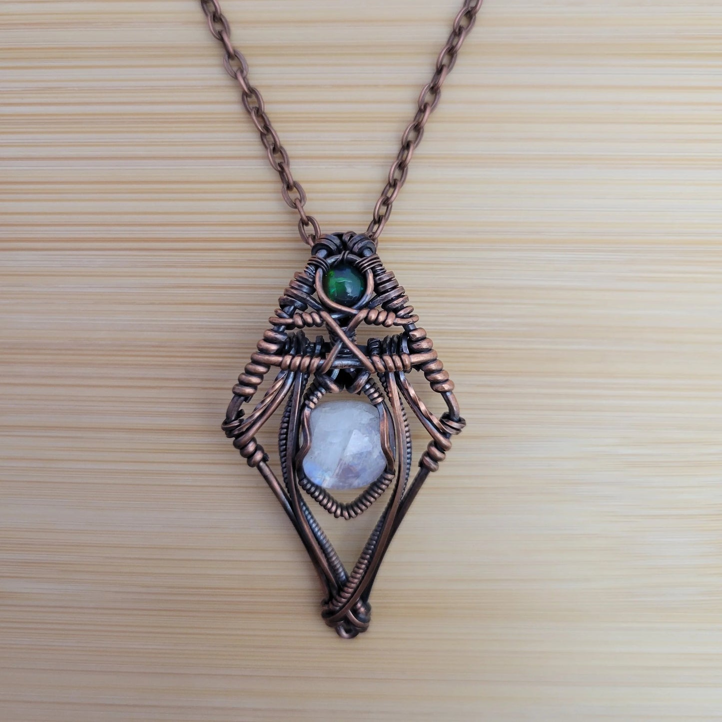 Handcrafted Black Opal and Rainbow Moonstone and Moonstone Copper Pendant Necklace — detail view