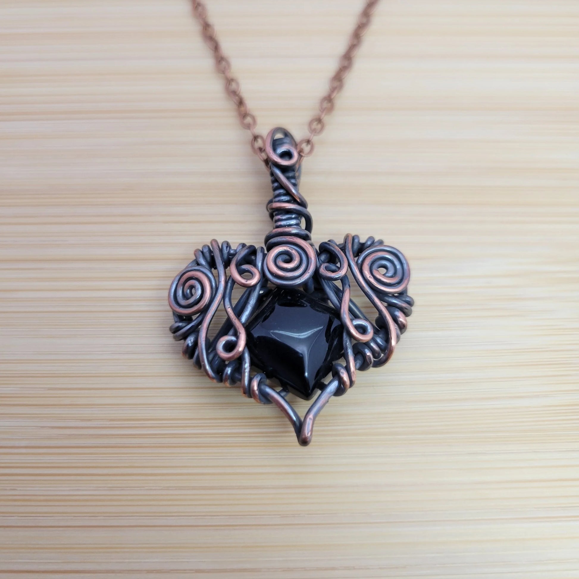 Handcrafted Black Onyx Copper Heart Pendant Necklace — detail view