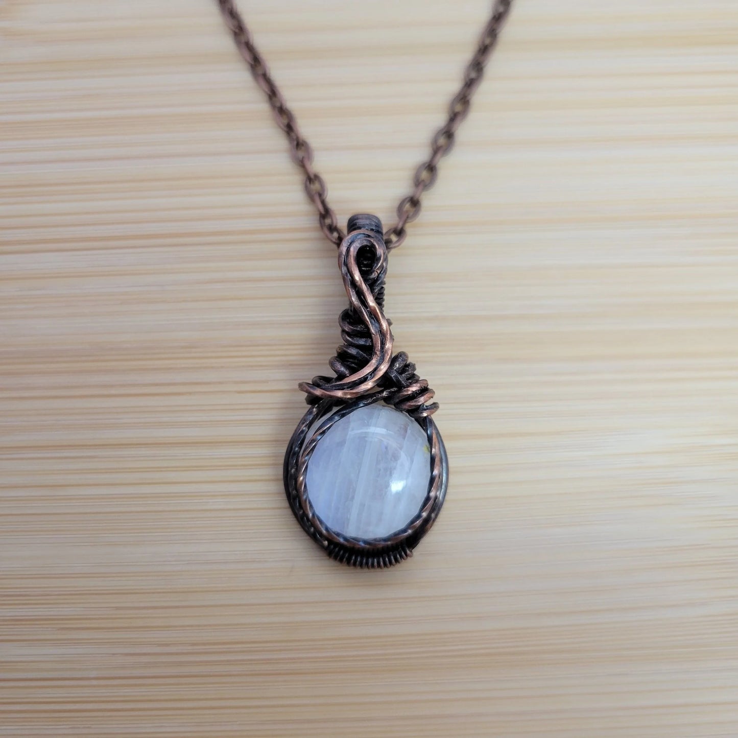 Handcrafted Rainbow Moonstone and Moonstone Copper Pendant Necklace — reverse view