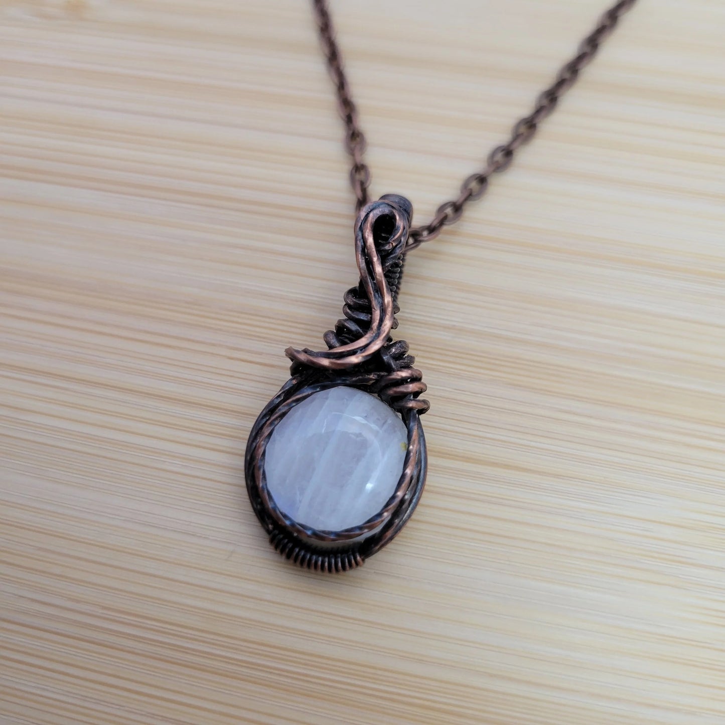 Handcrafted Rainbow Moonstone and Moonstone Copper Pendant Necklace — side view