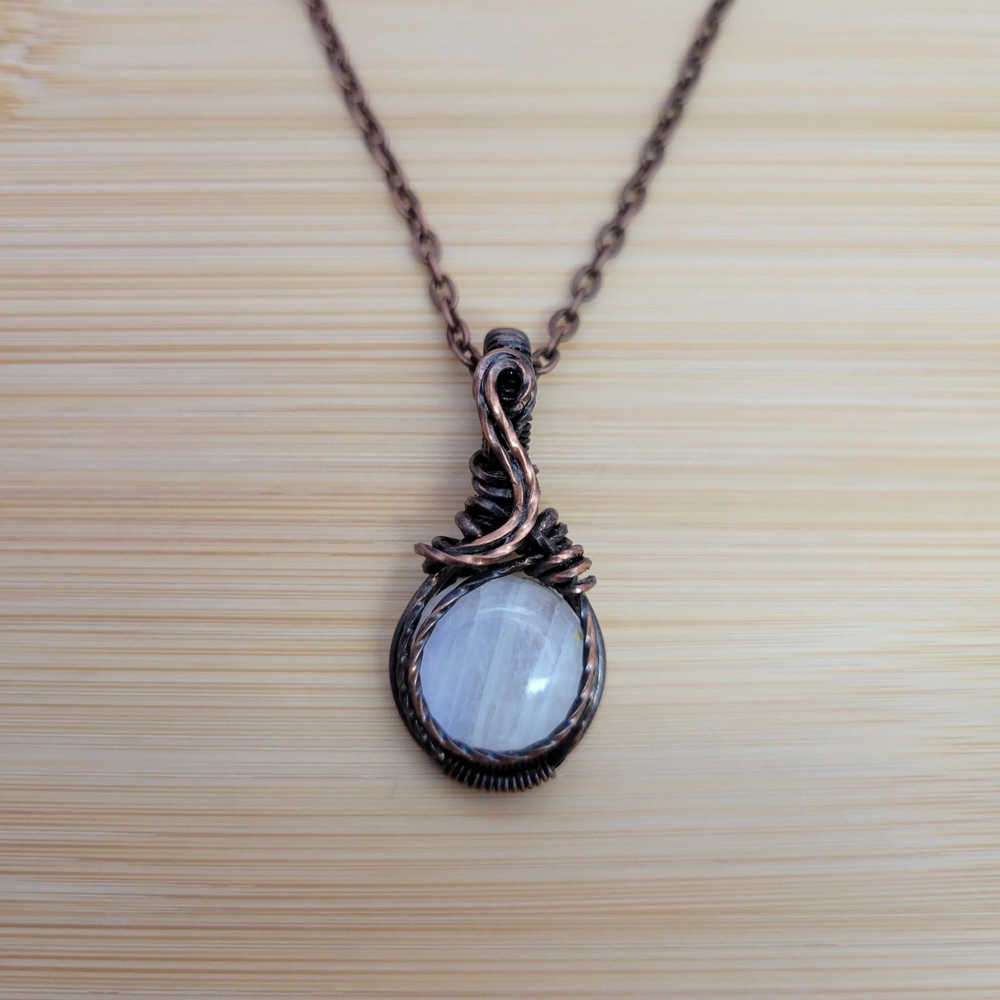 Handcrafted Rainbow Moonstone and Moonstone Copper Pendant Necklace — front view