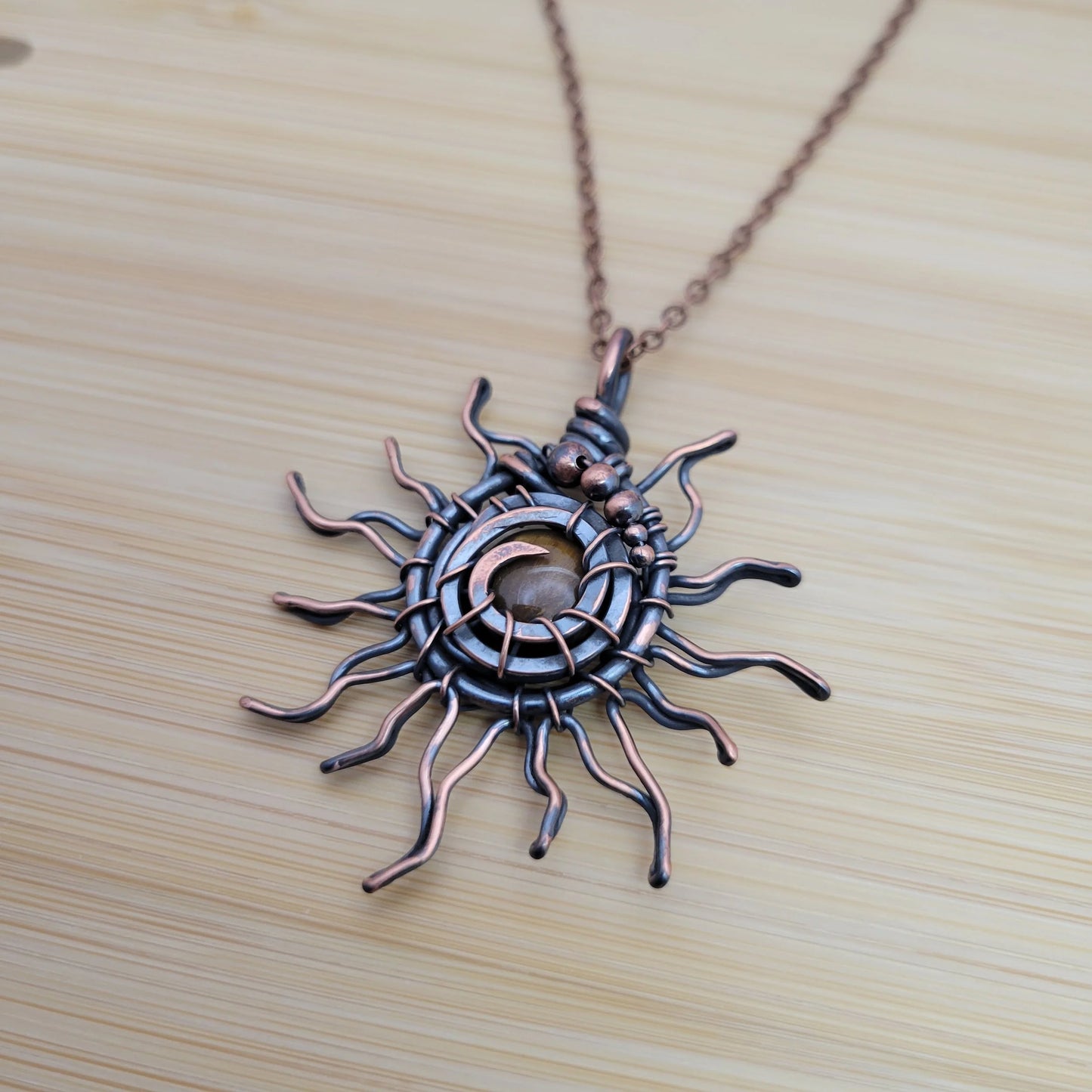Handcrafted Tiger's Eye Copper Sun Pendant Necklace — close-up