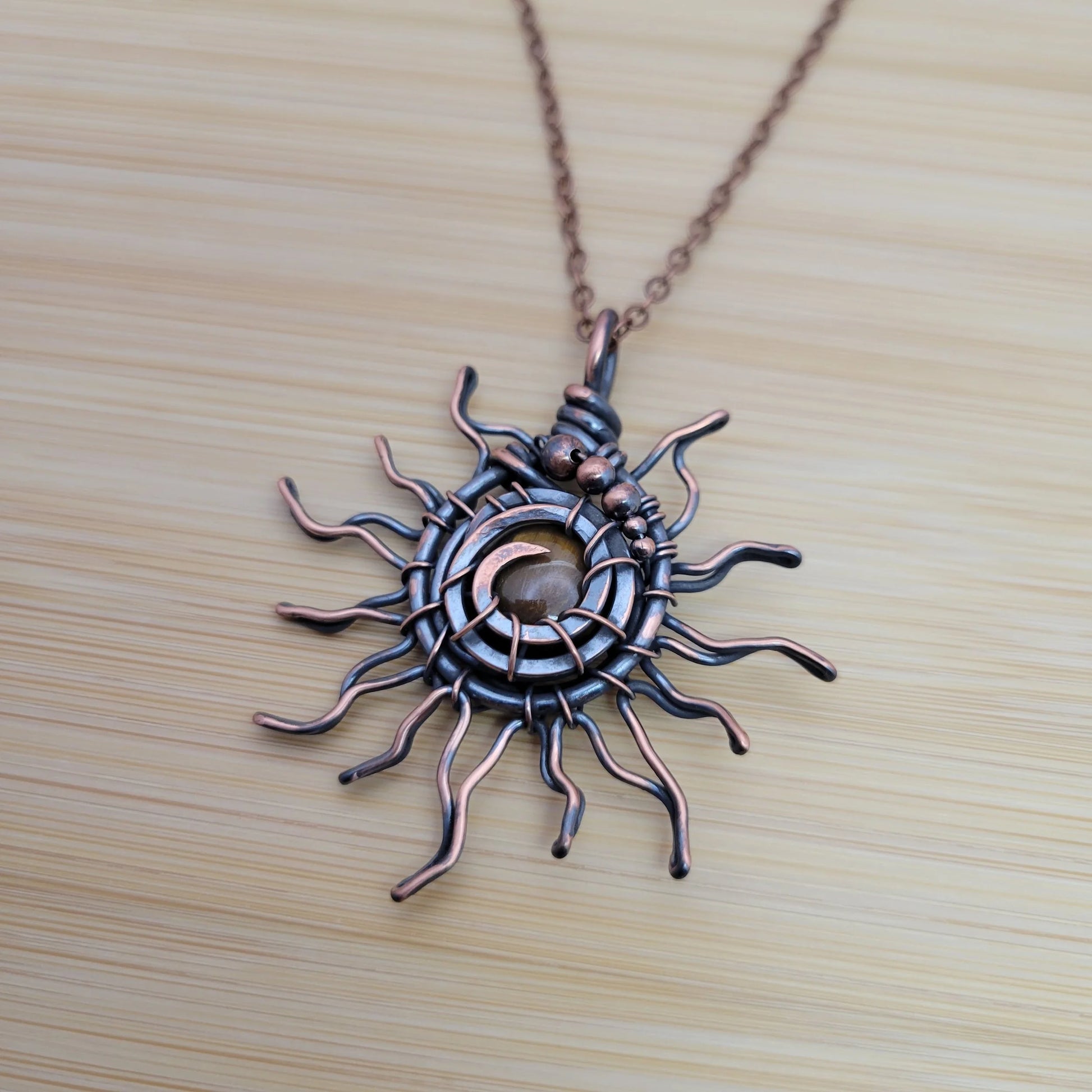 Handcrafted Tiger's Eye Copper Sun Pendant Necklace — reverse view
