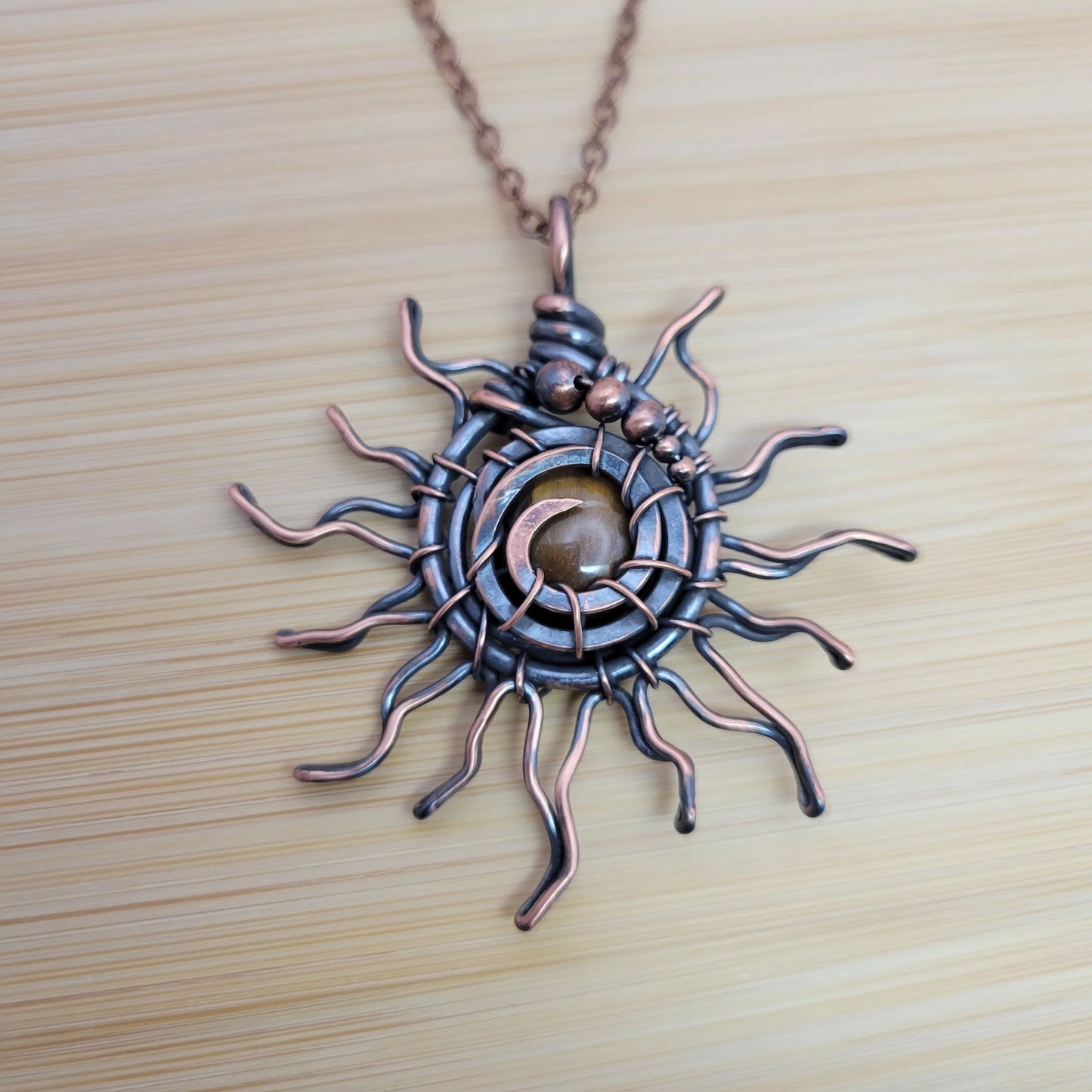 Handcrafted Tiger's Eye Copper Sun Pendant Necklace — front view
