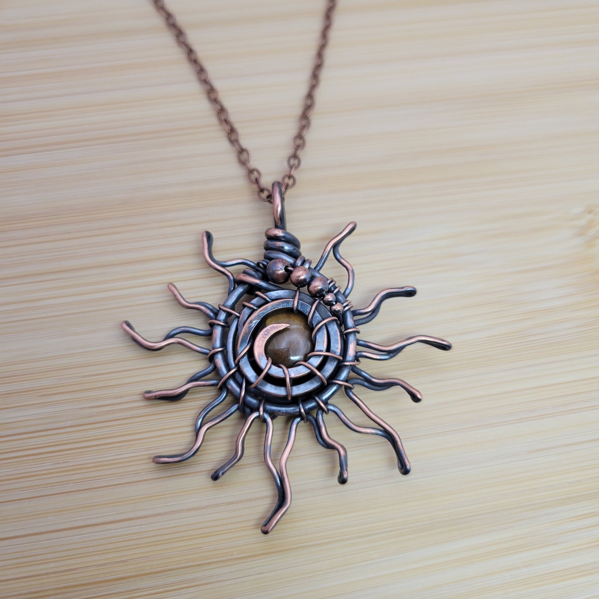 Handcrafted Tiger's Eye Copper Sun Pendant Necklace — side view