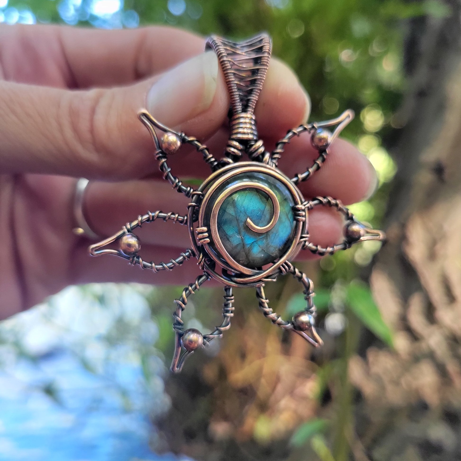 Handcrafted Labradorite Copper Flower Pendant Necklace — side view