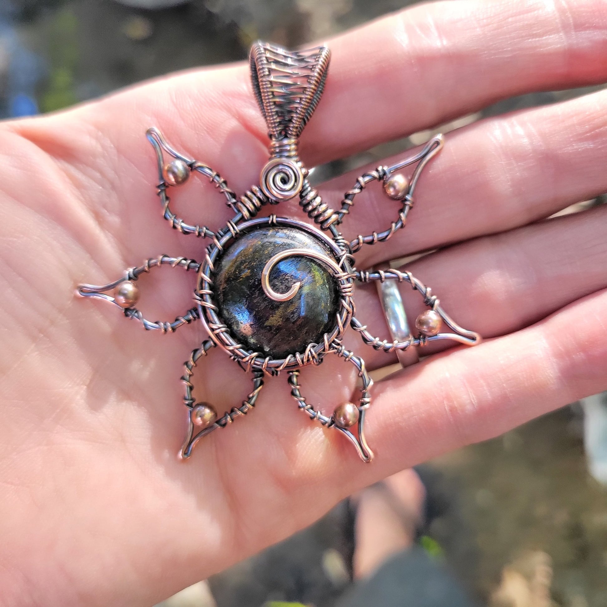 Handcrafted Copper Flower Pendant Necklace — close-up